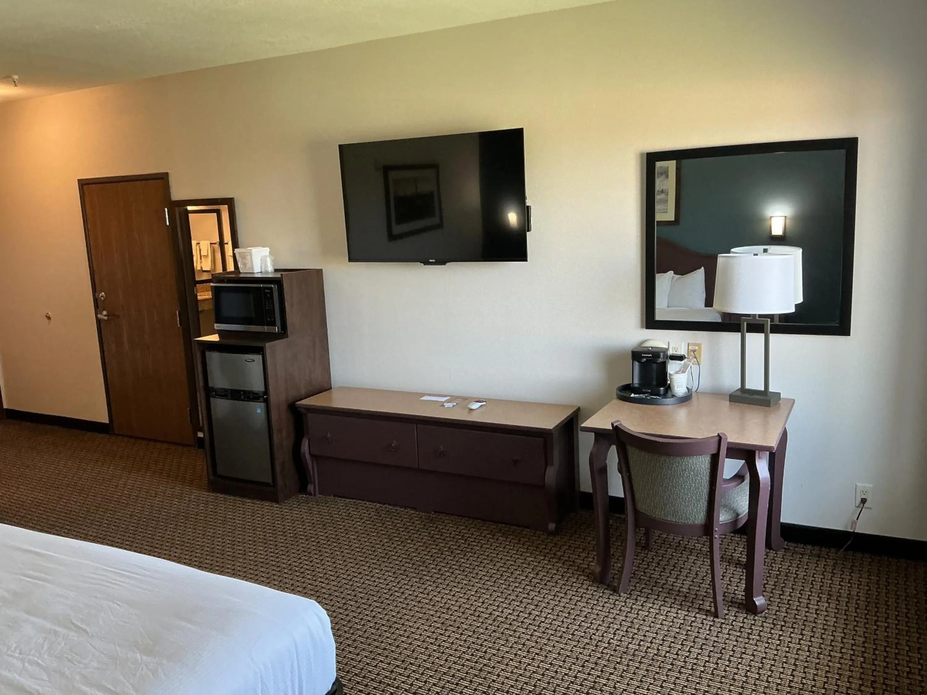 Bed in Tombstone Grand Hotel, a Baymont by Wyndham