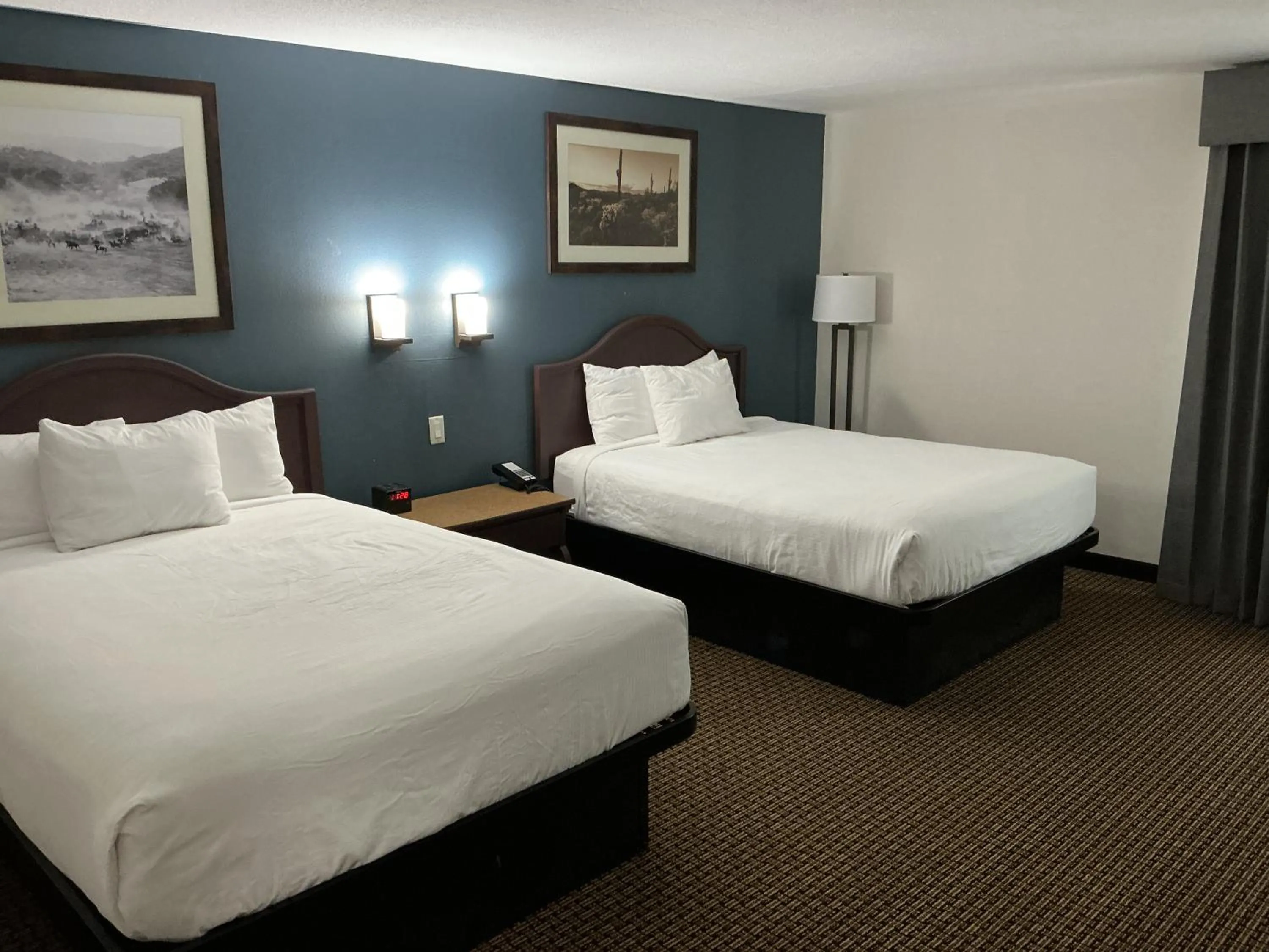 Bed in Tombstone Grand Hotel, a Baymont by Wyndham