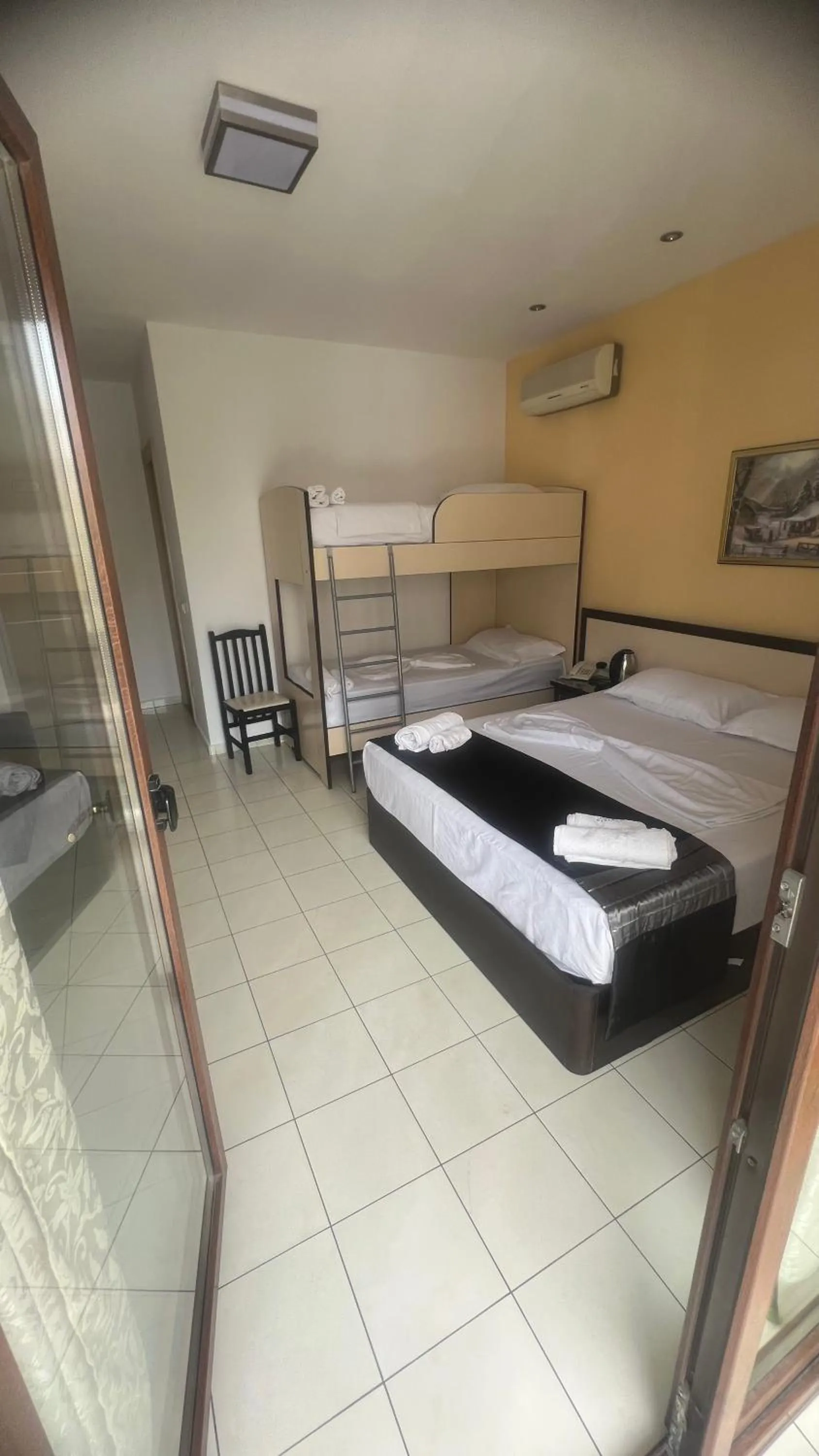 Bed in Sunrise Hotel Cameria