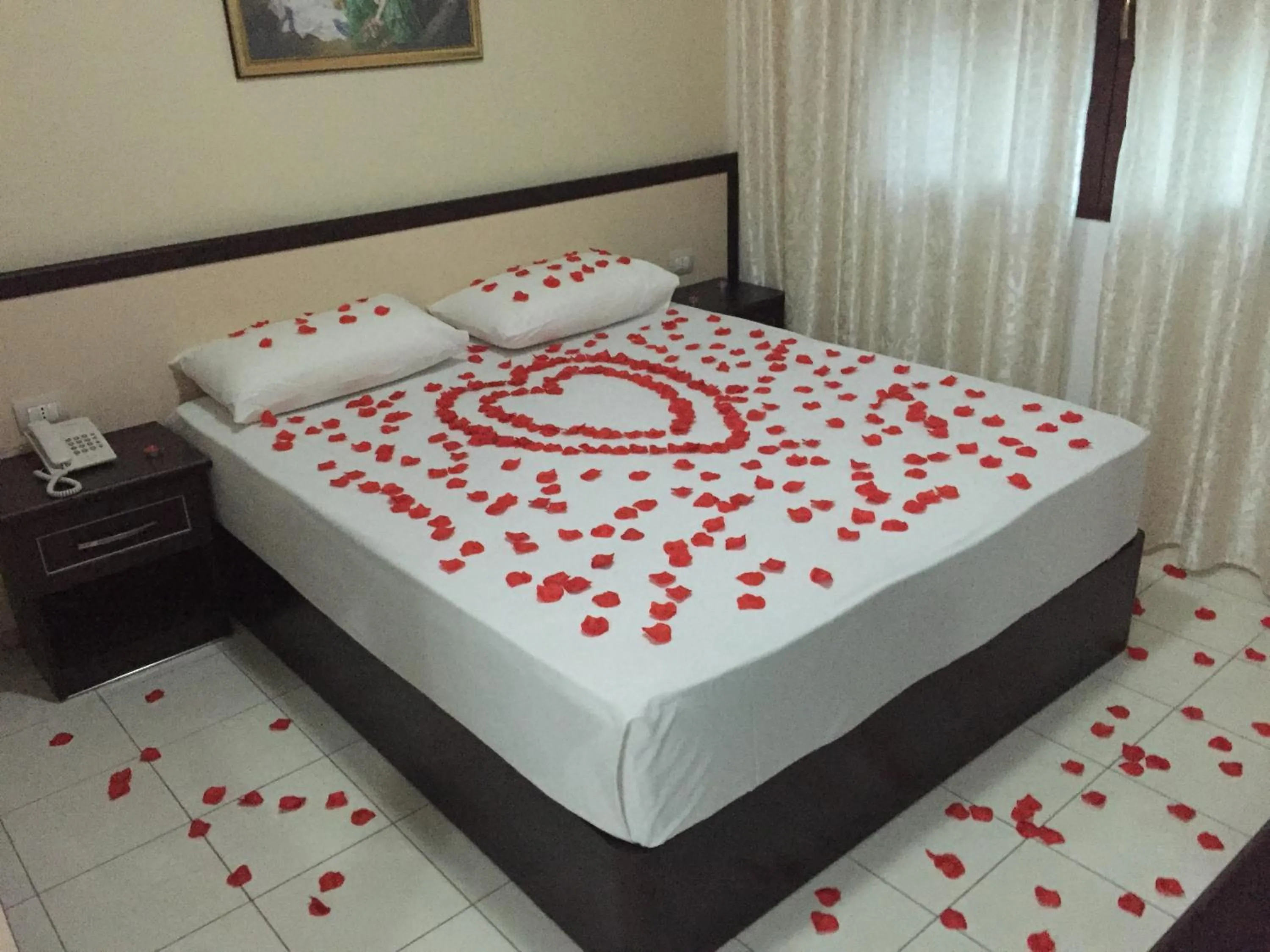 Bed in Sunrise Hotel Cameria