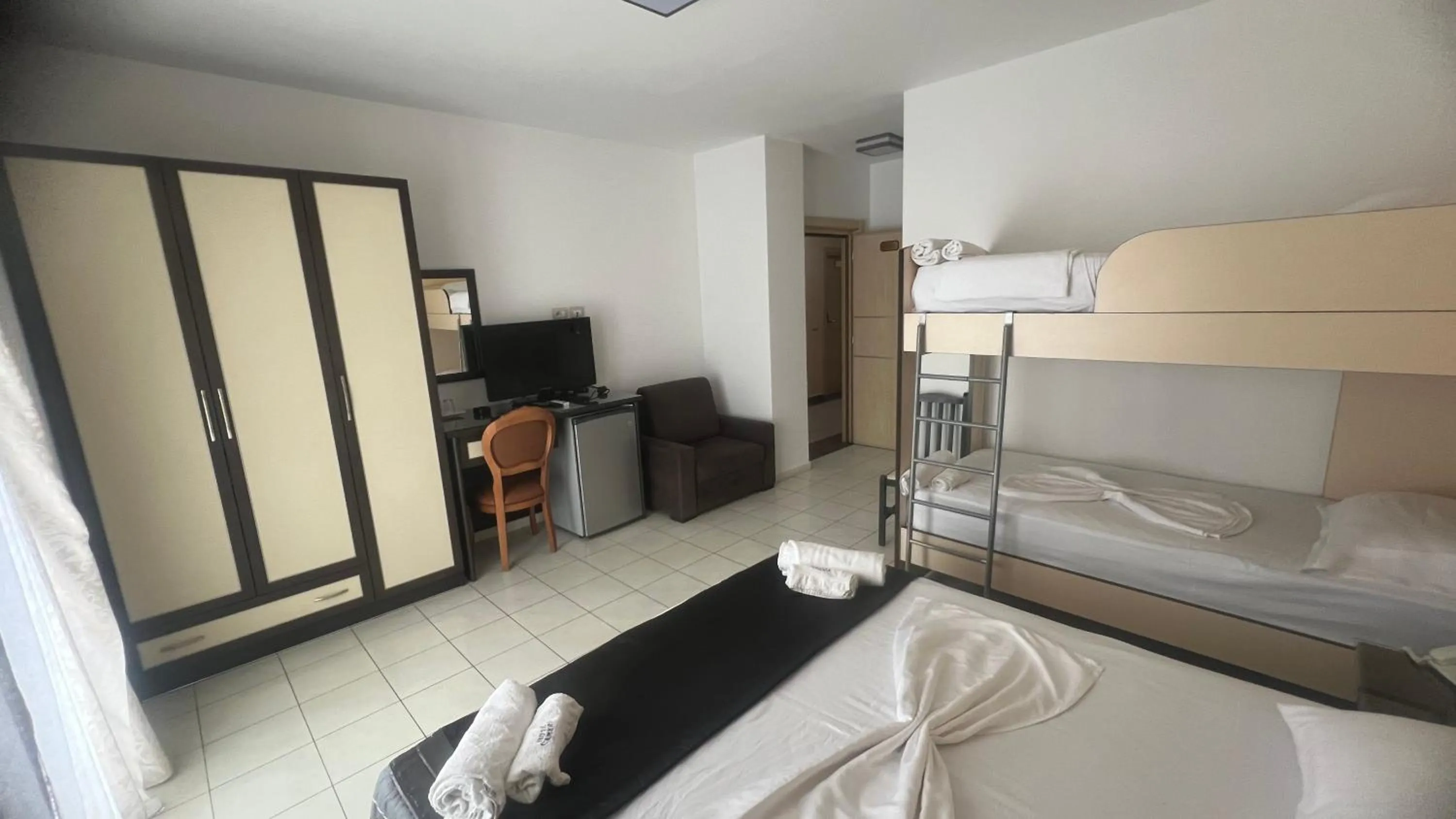 Bed in Sunrise Hotel Cameria