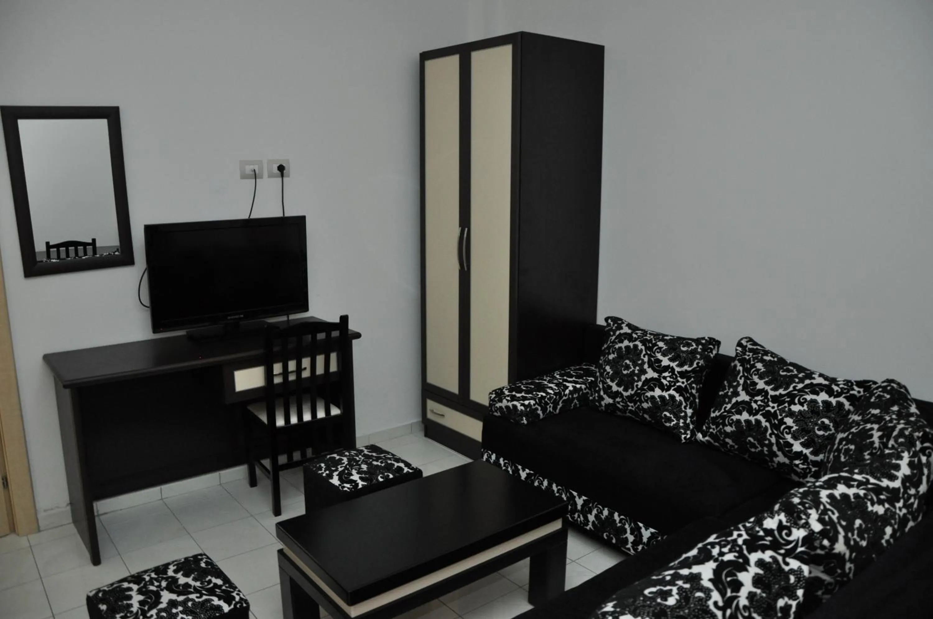 Living room, Bed in Sunrise Hotel Cameria