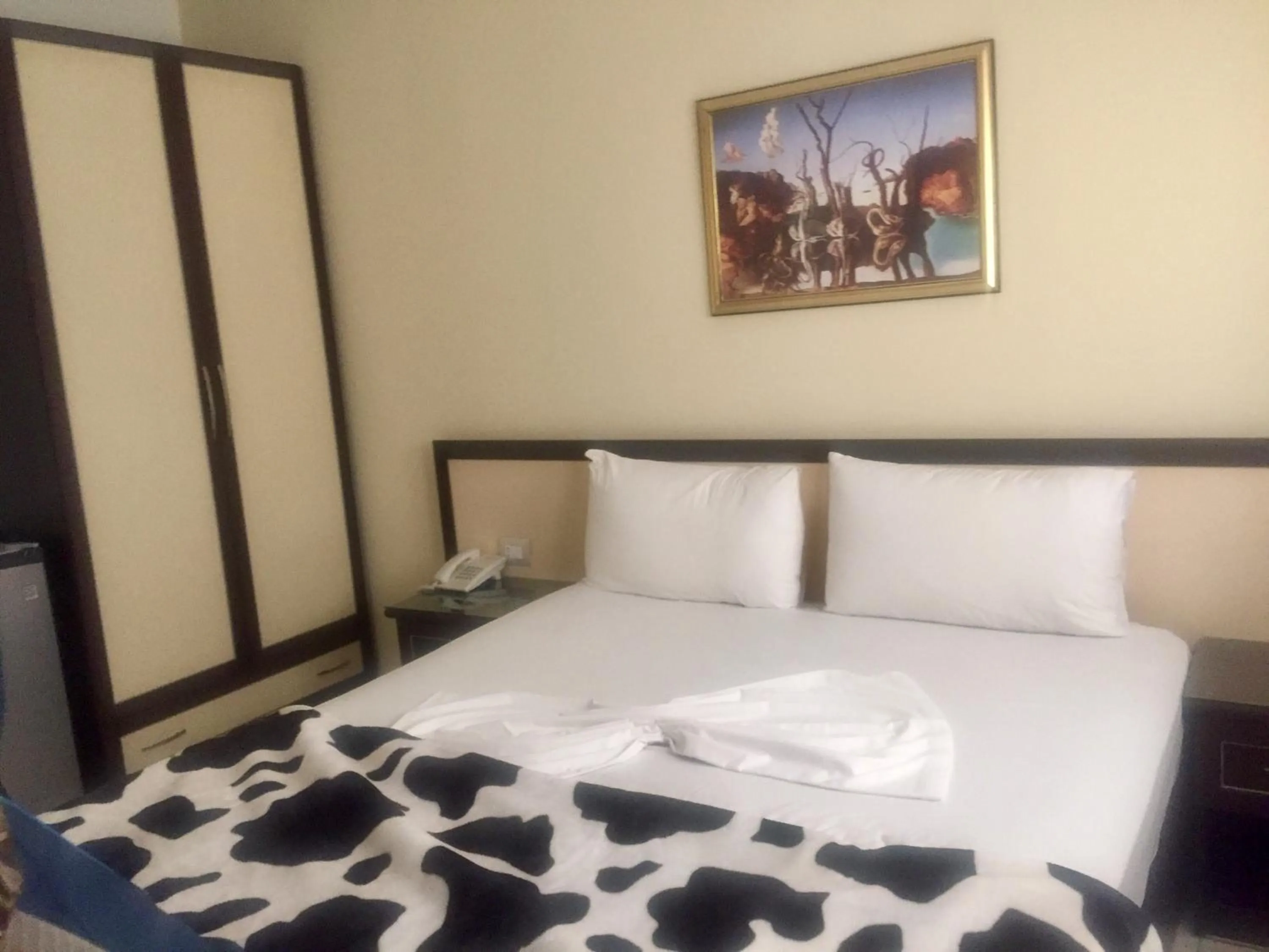 Bed in Sunrise Hotel Cameria