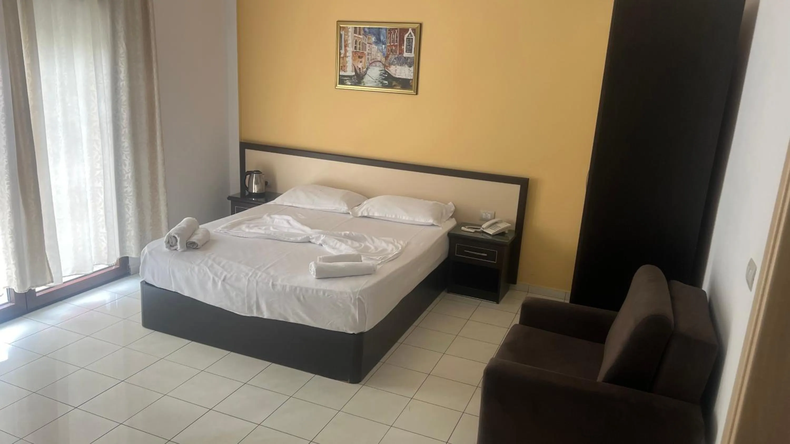 Bed in Sunrise Hotel Cameria