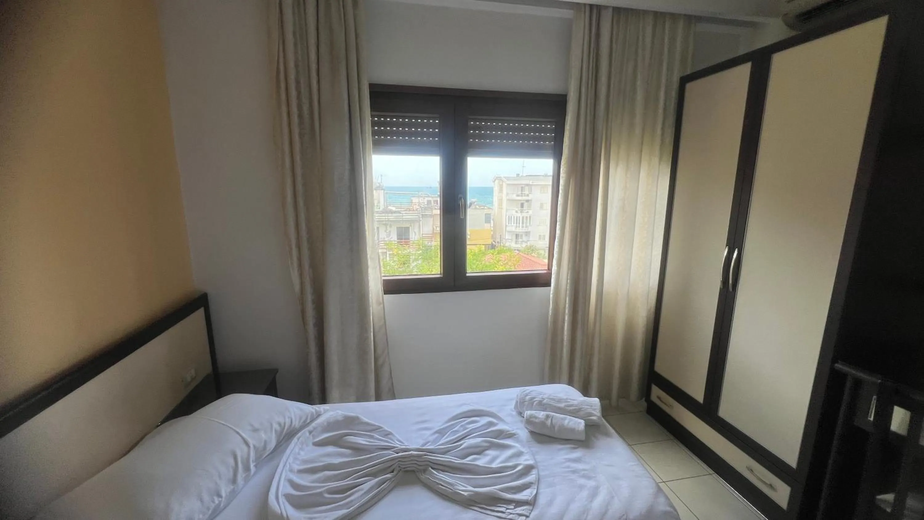 Bed in Sunrise Hotel Cameria