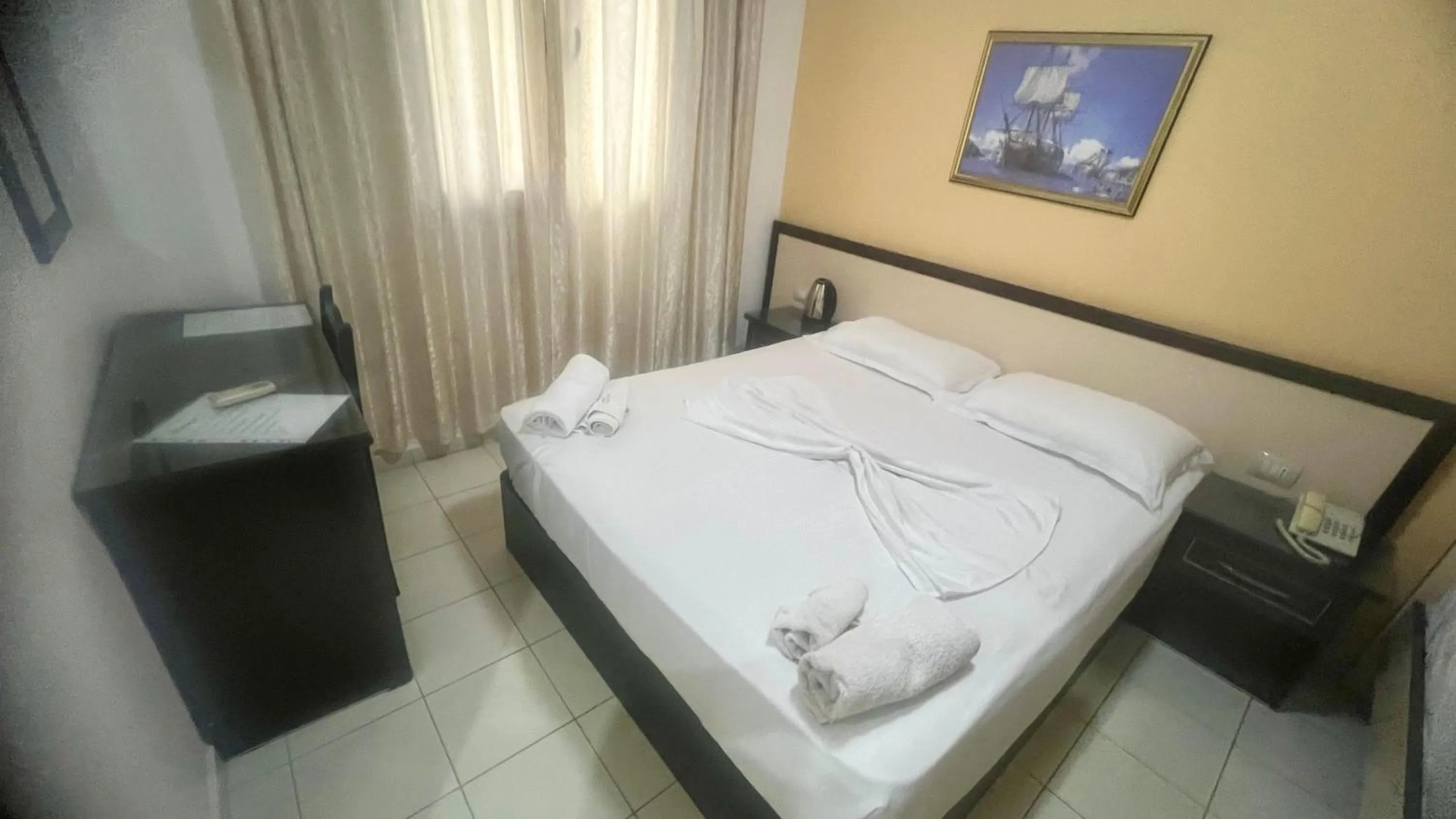 Bed in Sunrise Hotel Cameria