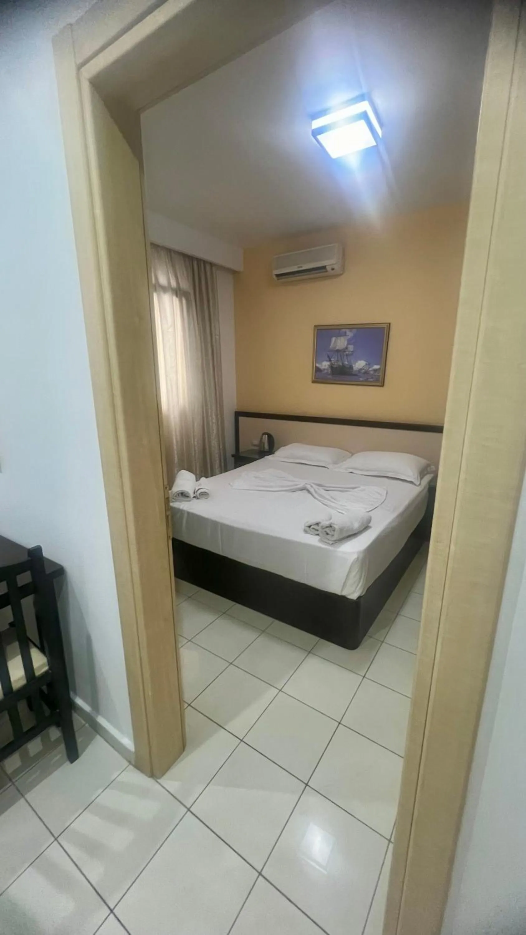 Bed in Sunrise Hotel Cameria