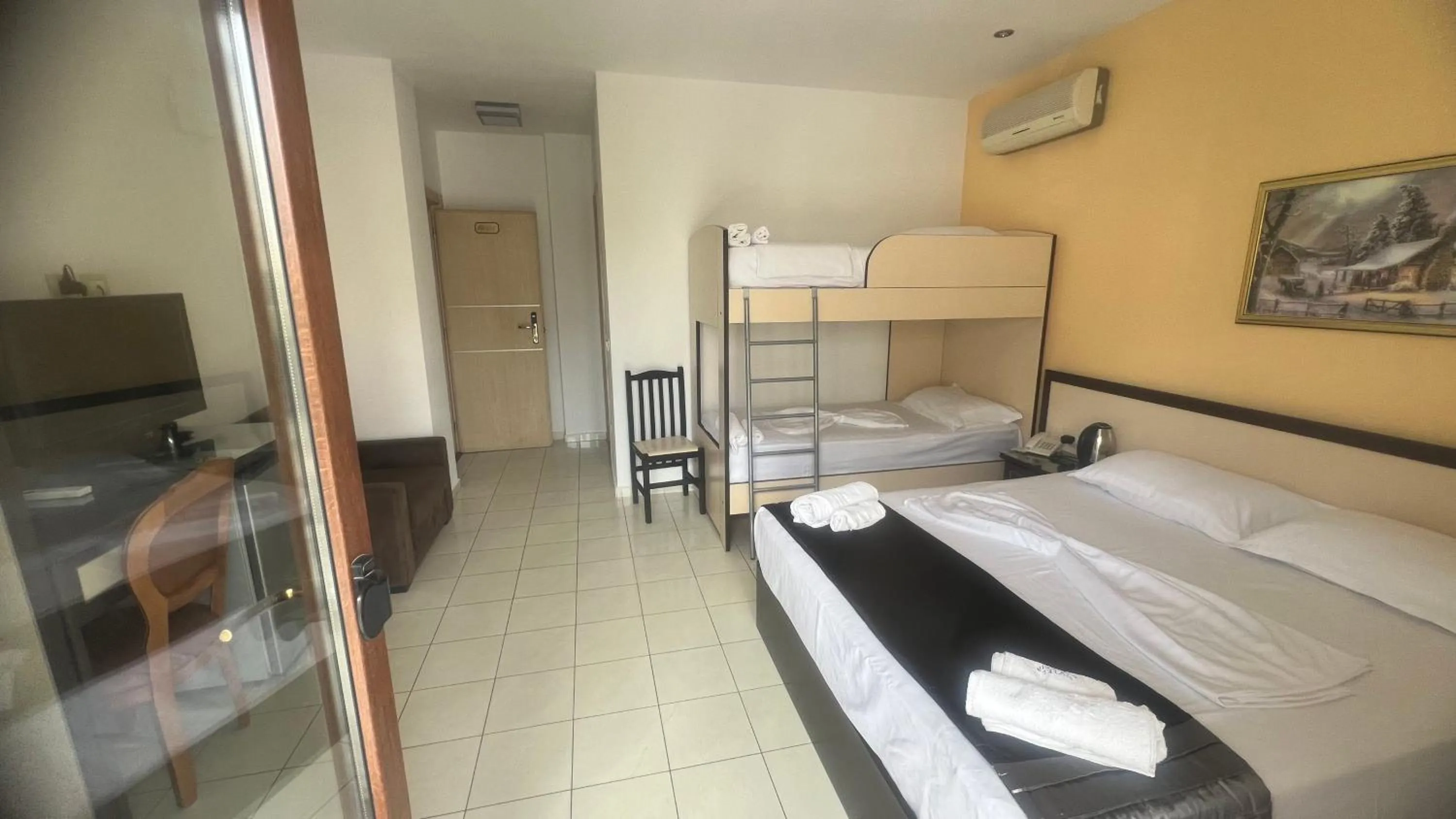 Bed in Sunrise Hotel Cameria