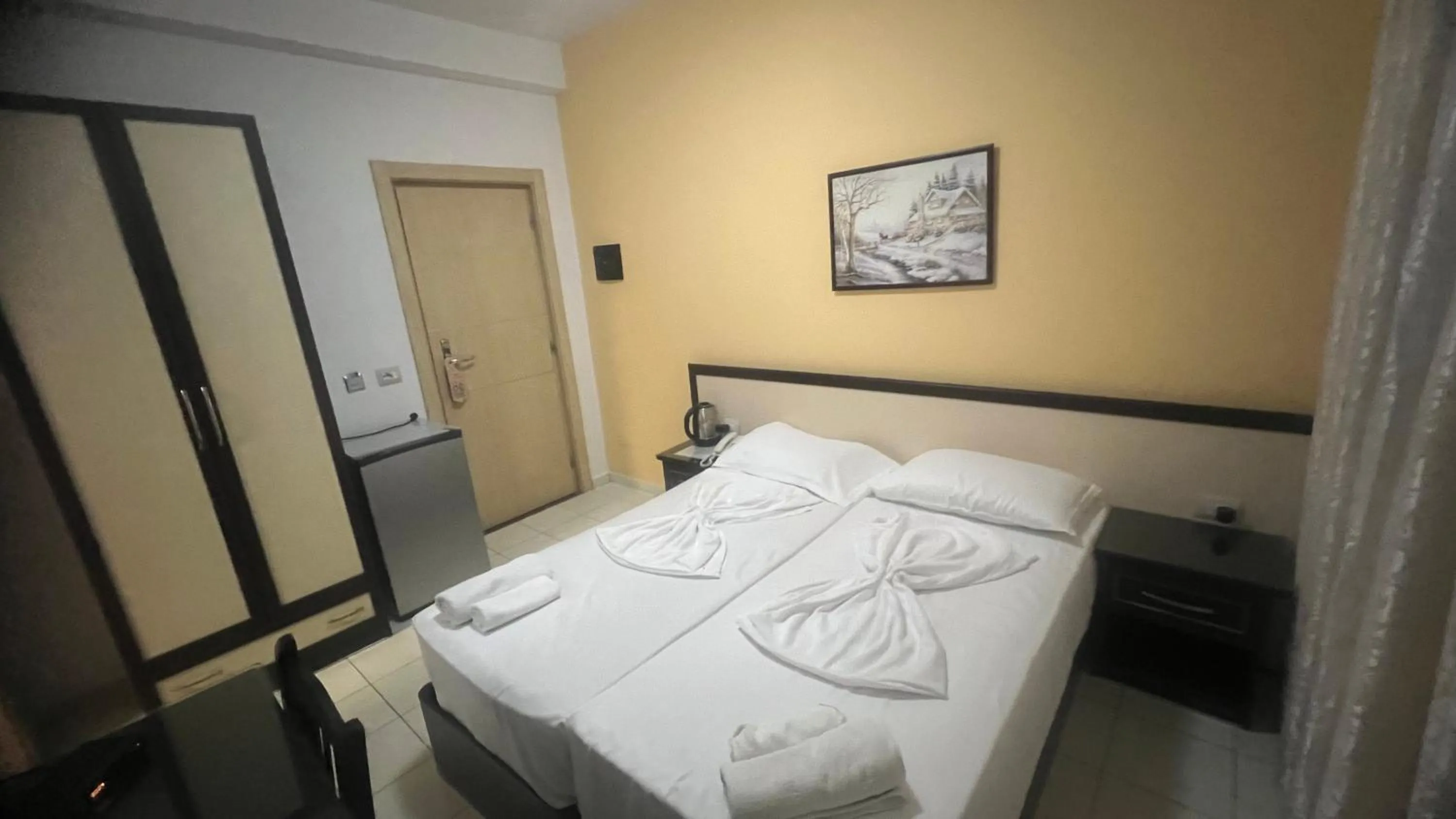 Bed in Sunrise Hotel Cameria