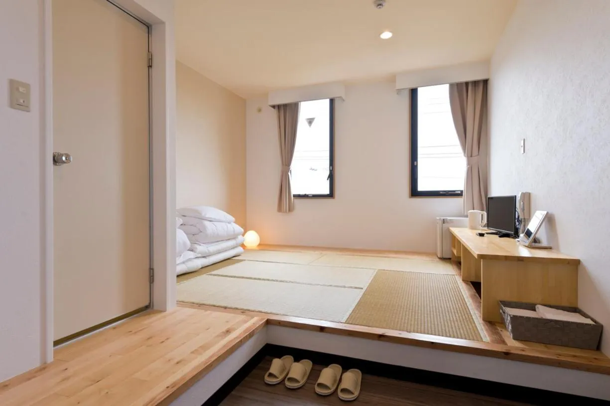 Photo of the whole room in Onna Japanese Style Hotel Hokkaisou