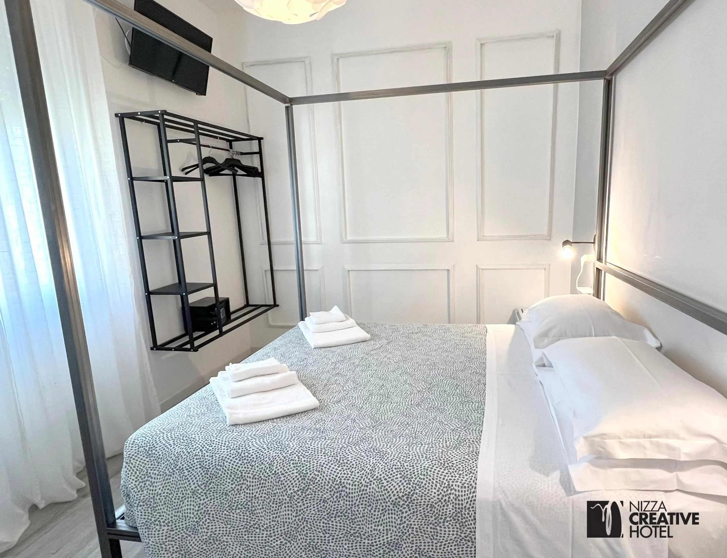 Bed in Hotel Nizza Creative Hotel