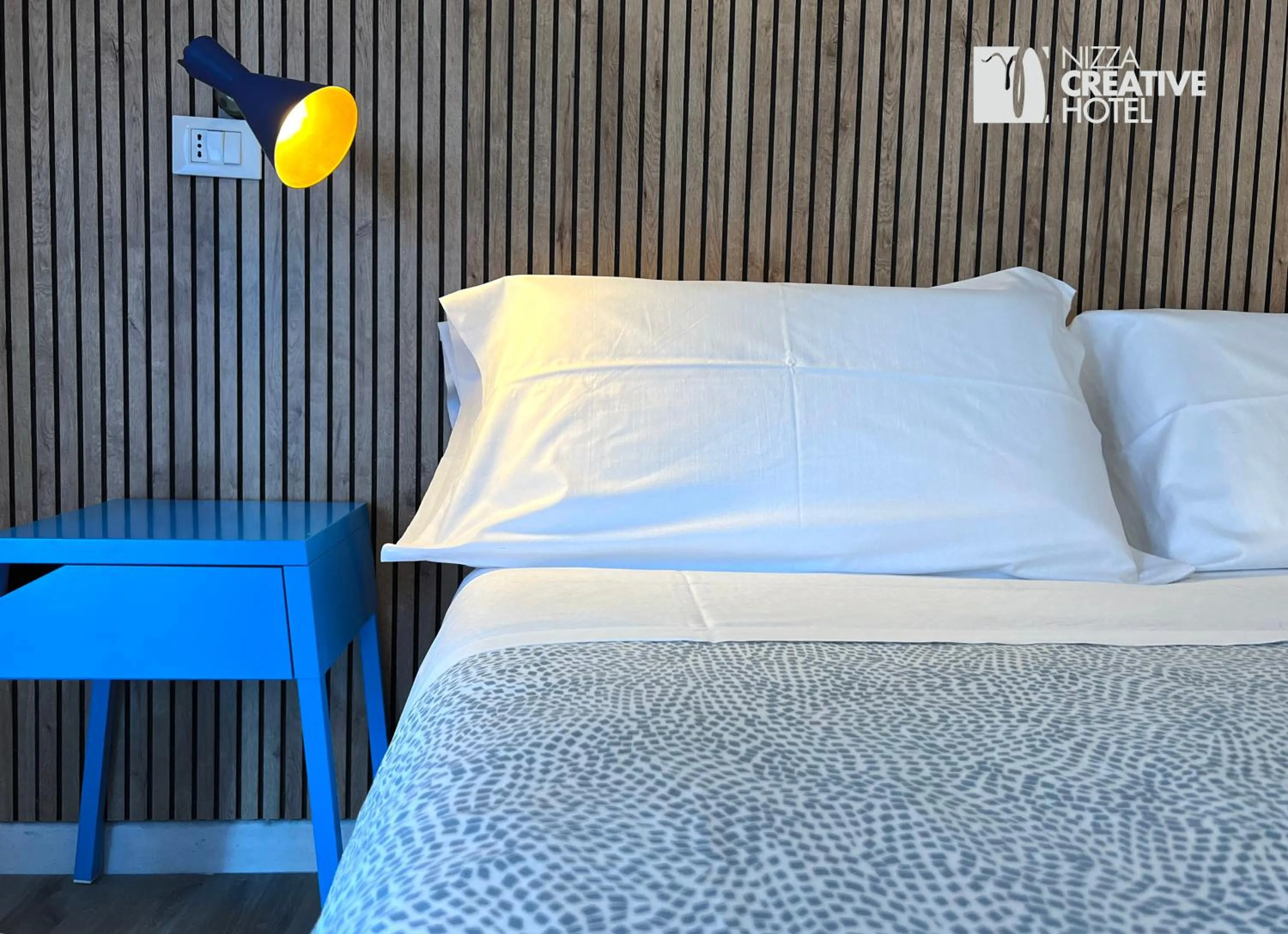 Bed in Hotel Nizza Creative Hotel