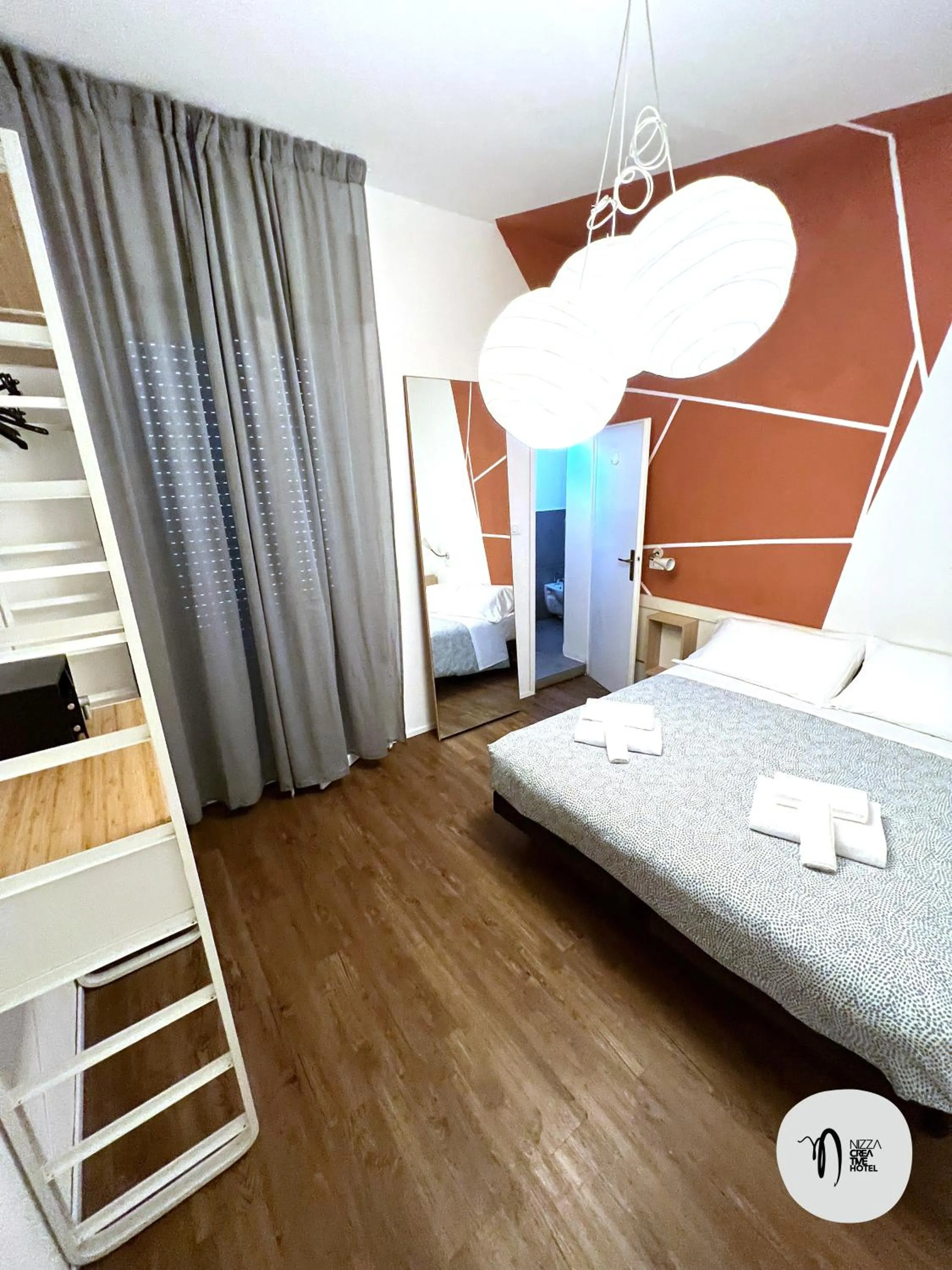 Bed in Hotel Nizza Creative Hotel