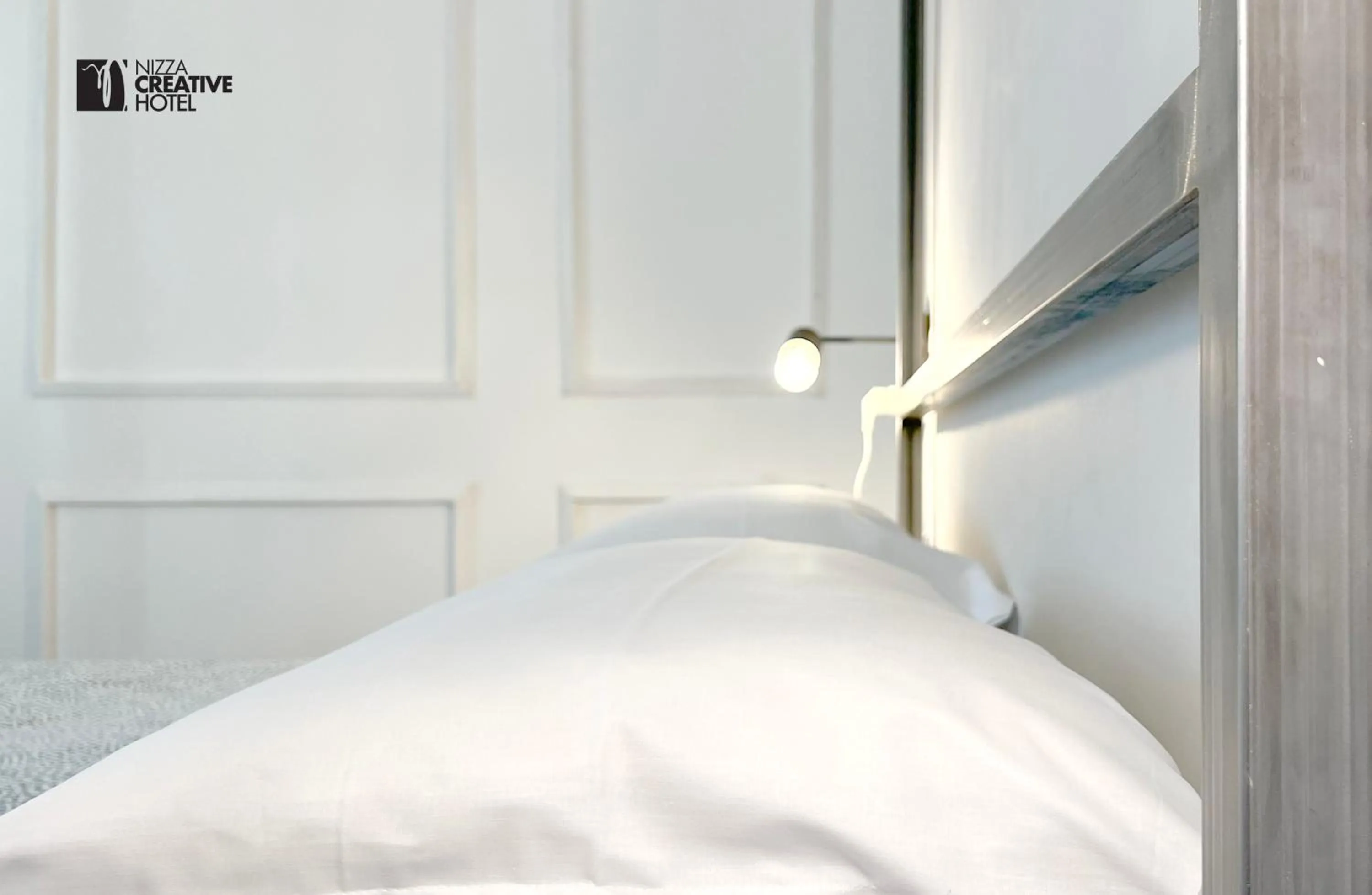 Bed in Hotel Nizza Creative Hotel