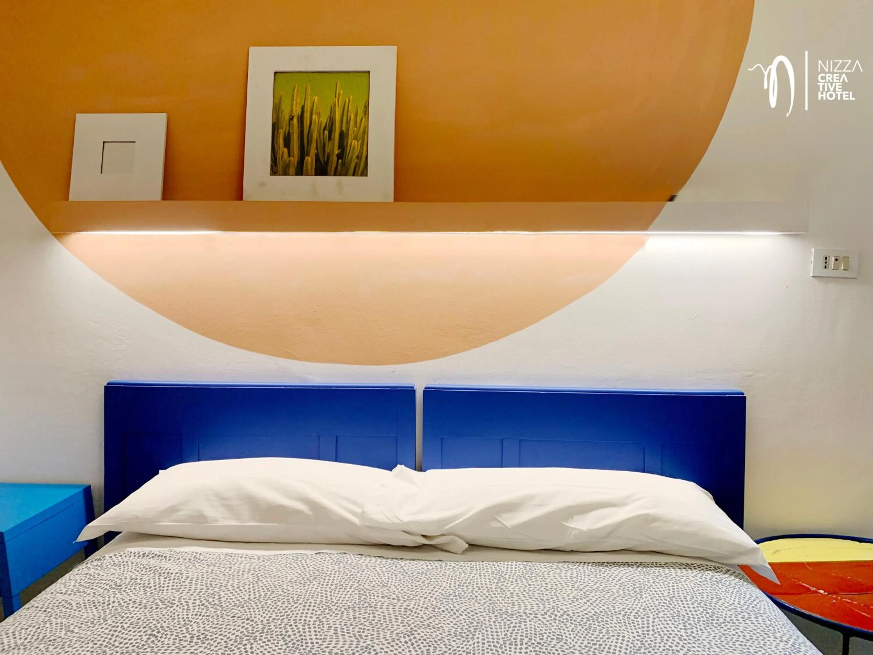 Bed in Hotel Nizza Creative Hotel