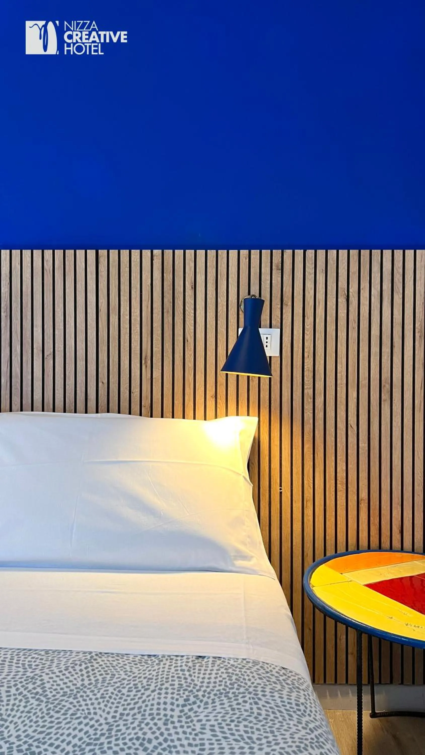 Bed in Hotel Nizza Creative Hotel