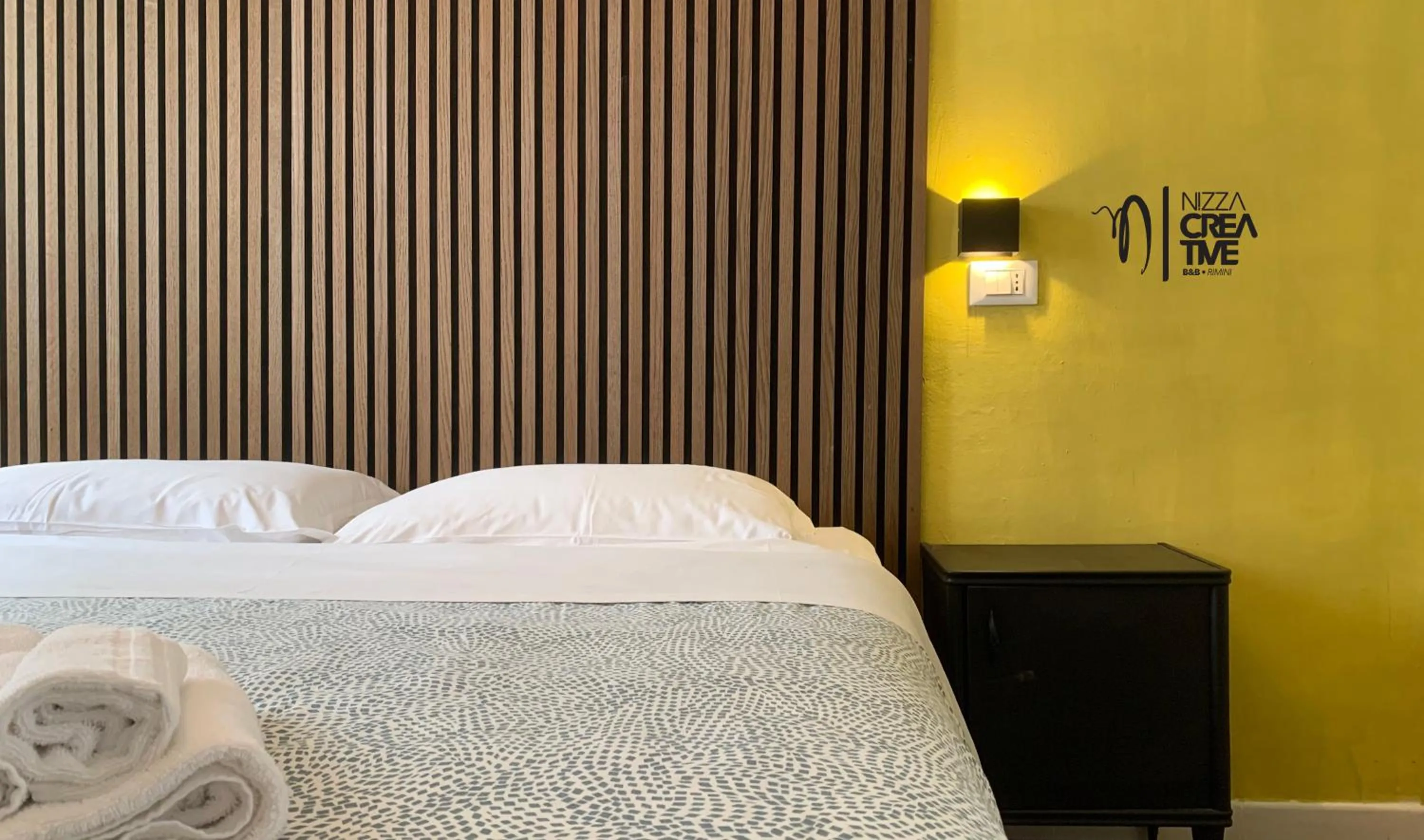 Bed in Hotel Nizza Creative Hotel