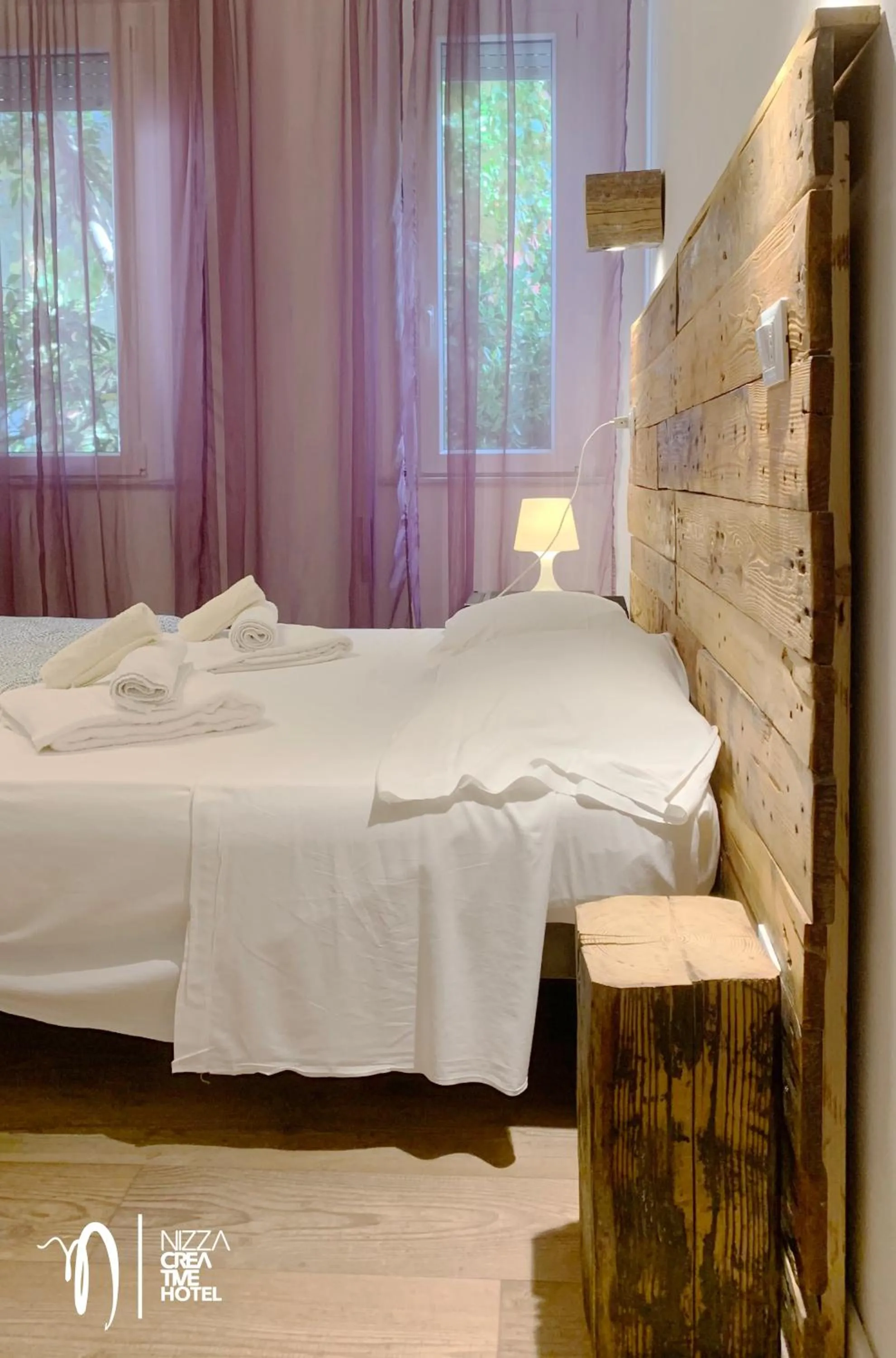 Bed in Hotel Nizza Creative Hotel