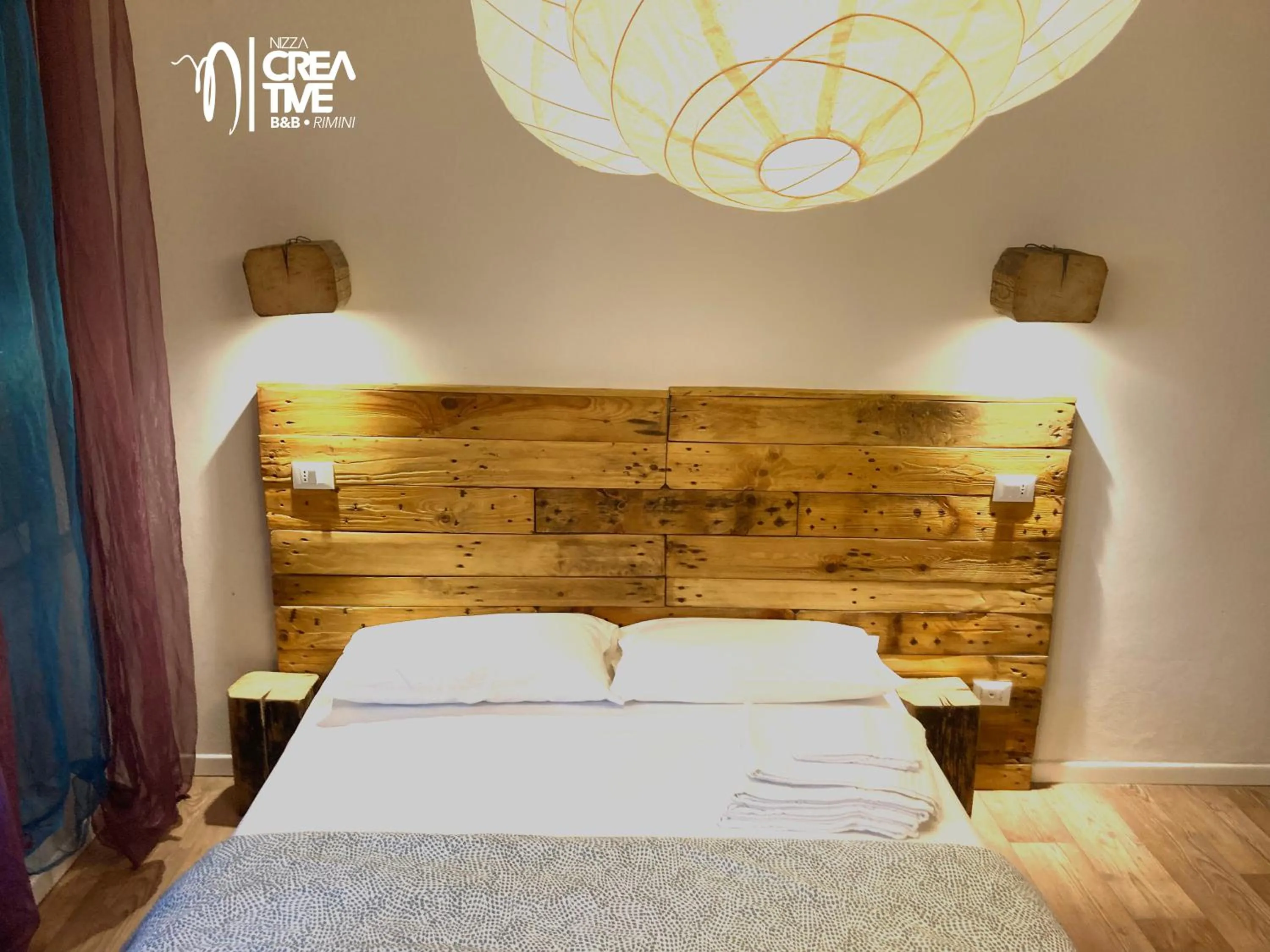 Bed in Hotel Nizza Creative Hotel