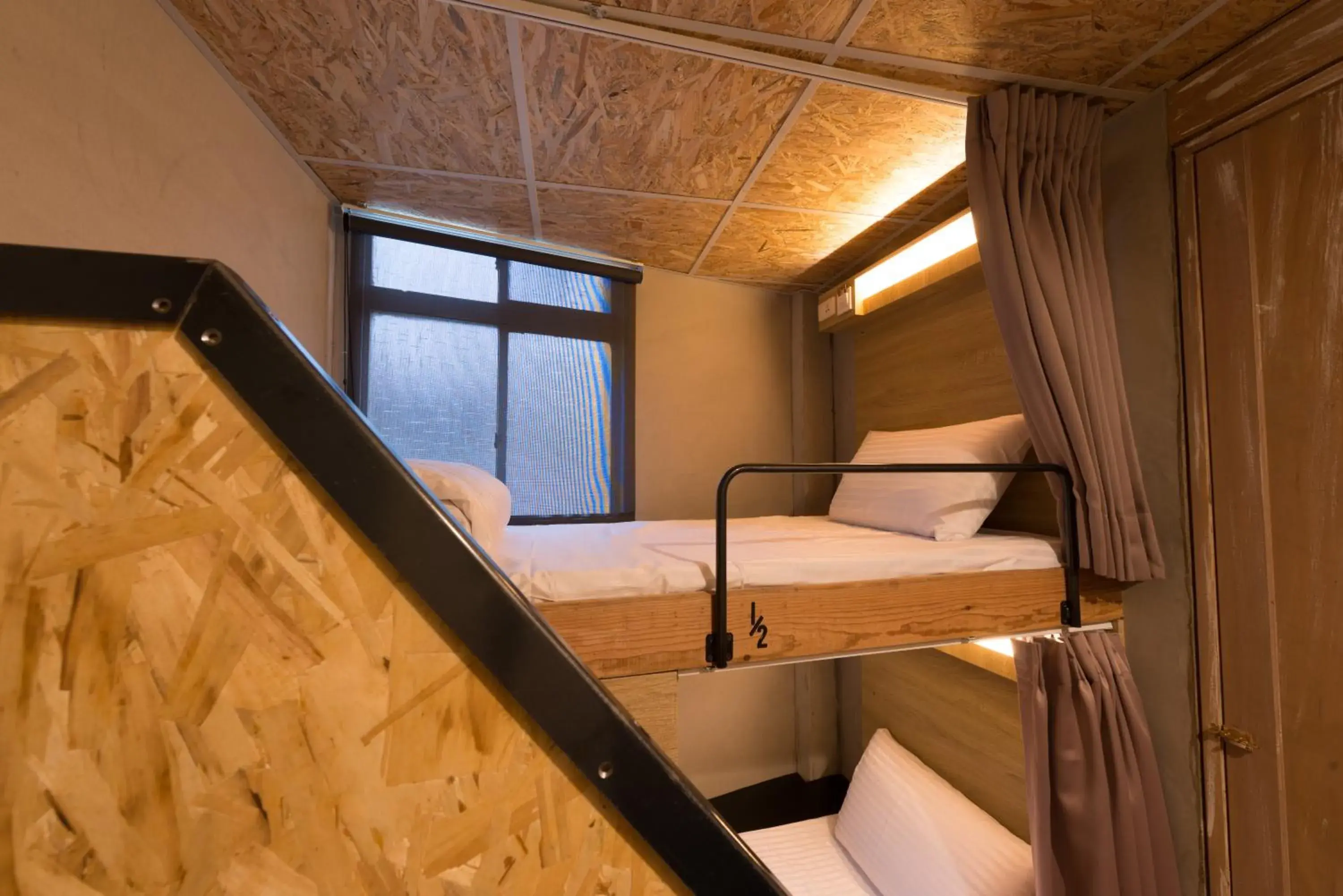 bunk bed, Bed in Beimen Wow Poshtel