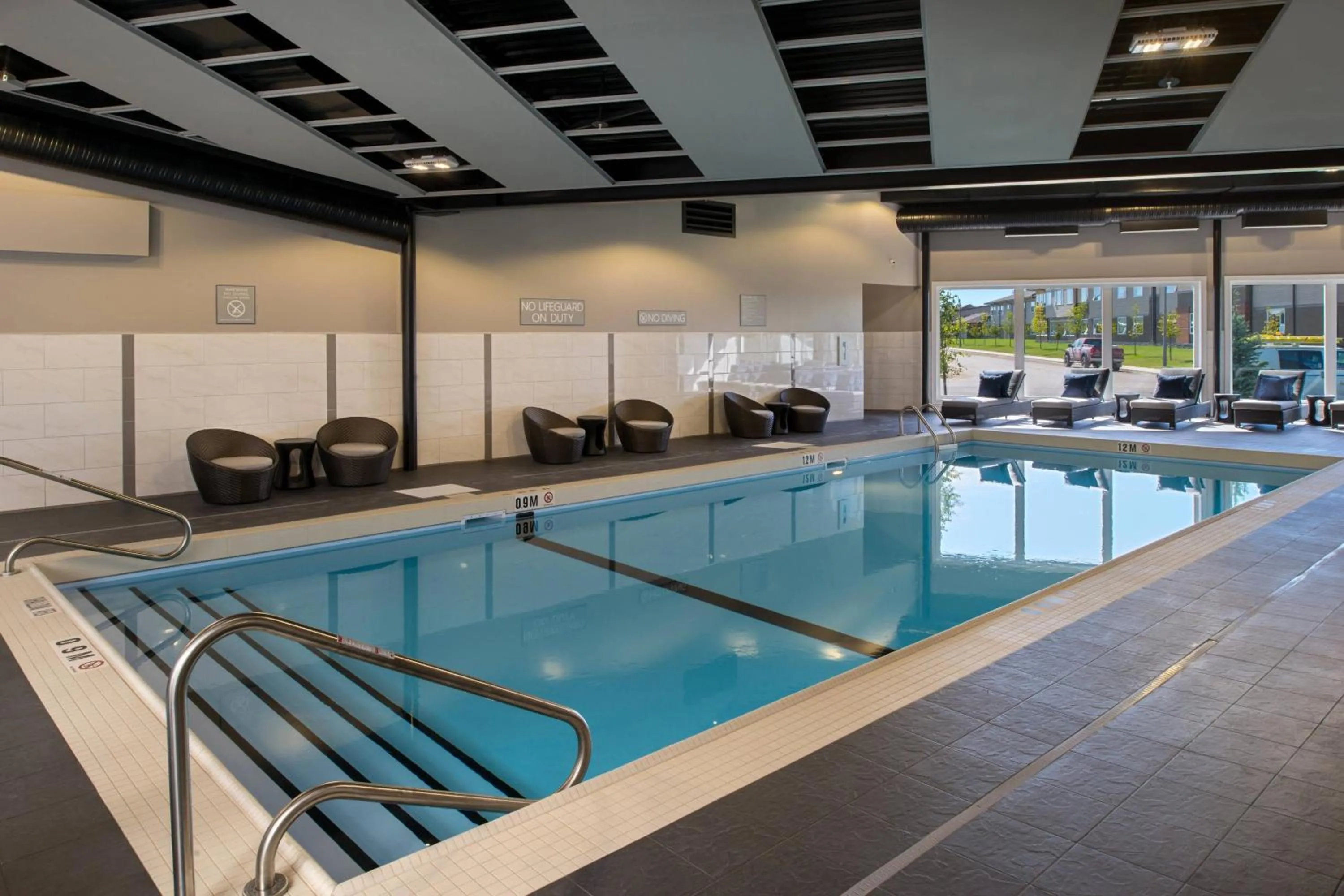 Swimming pool in TownePlace Suites by Marriott Saskatoon