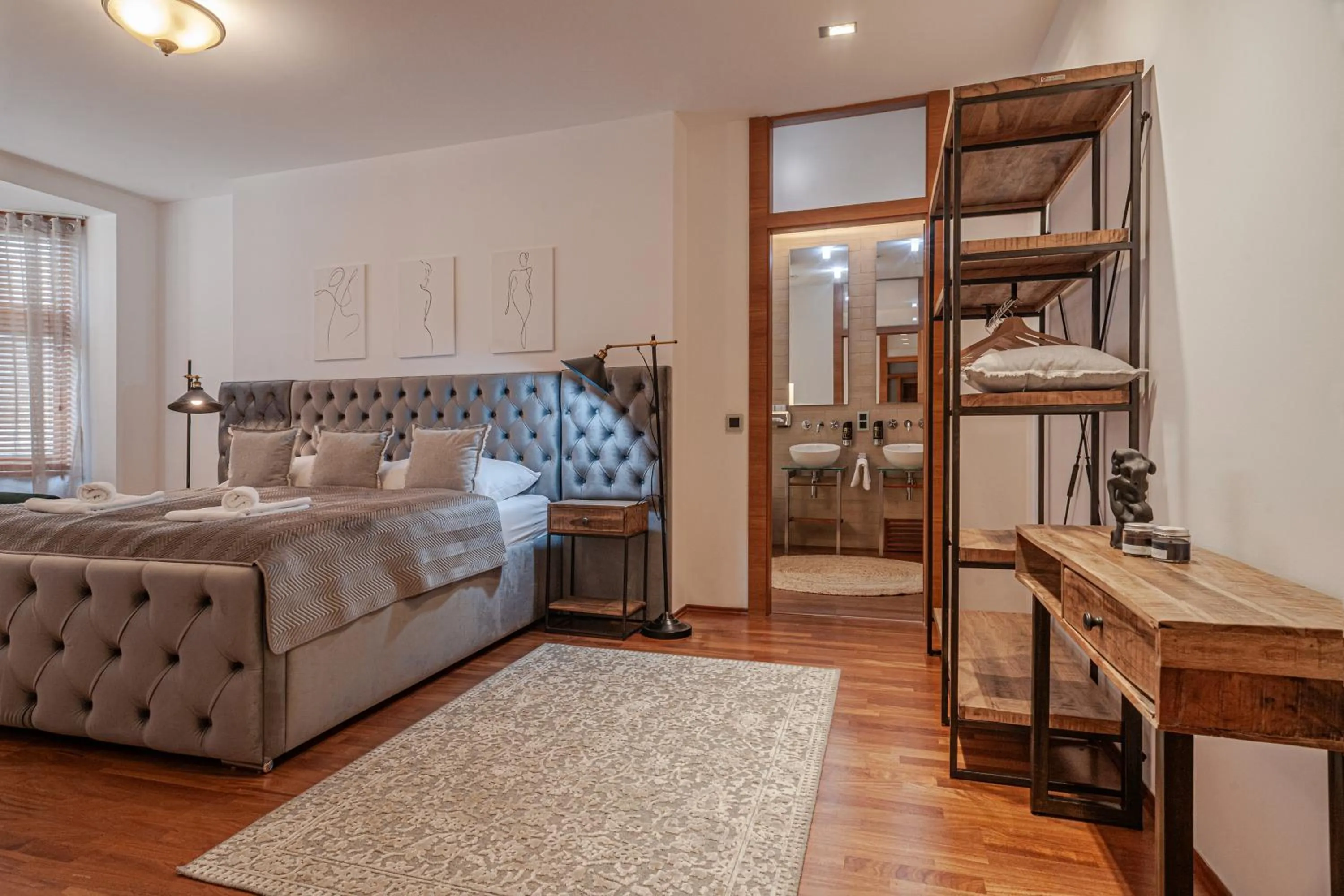 Bed in STING Boutique Apartments