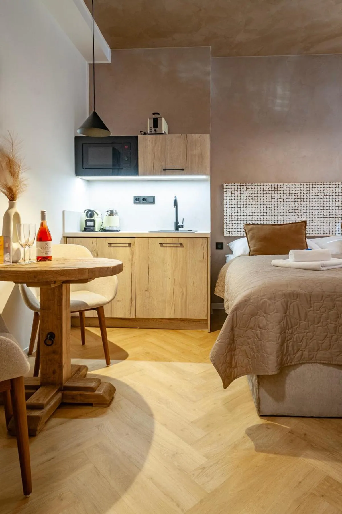 Bed in STING Boutique Apartments