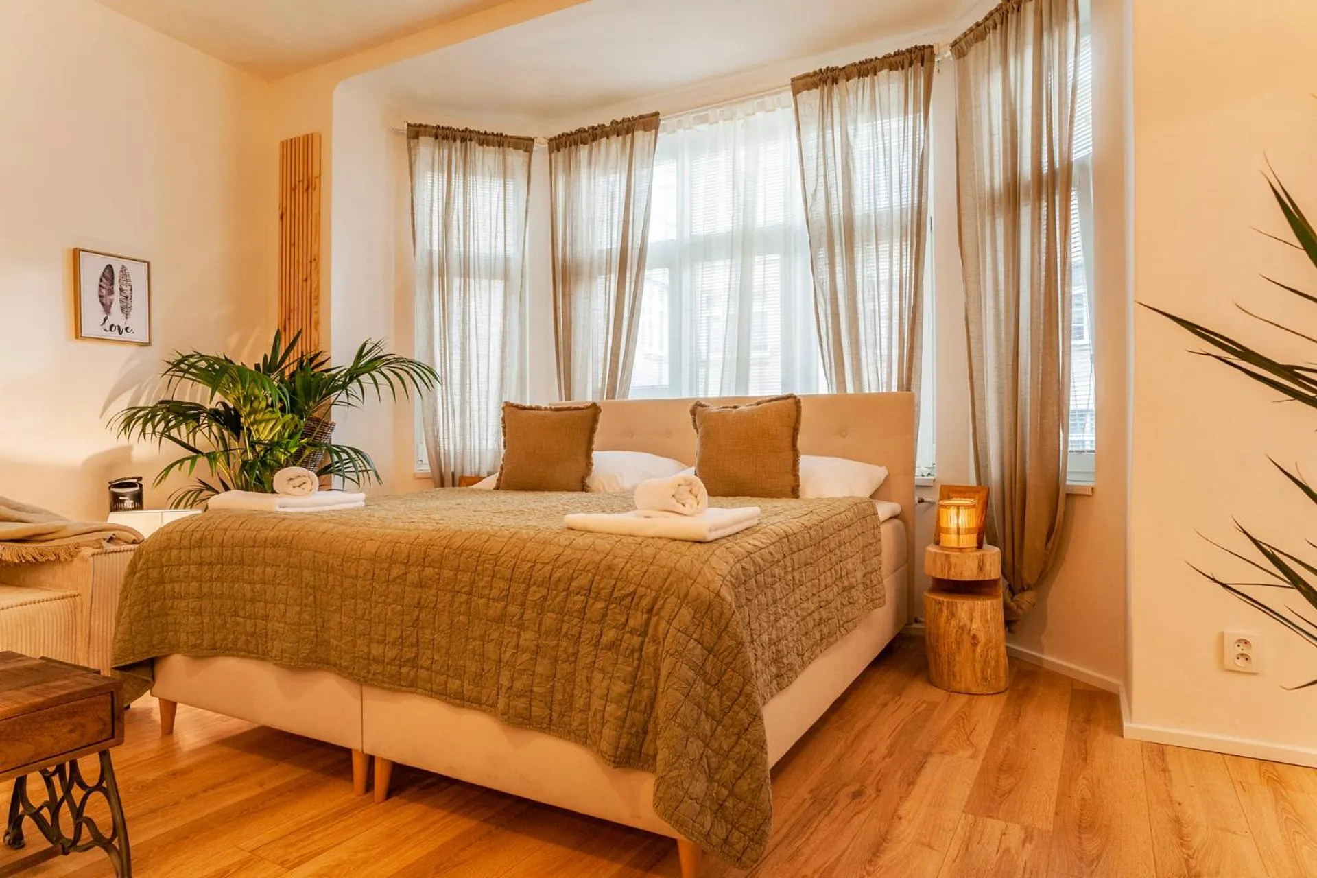Bed in STING Boutique Apartments