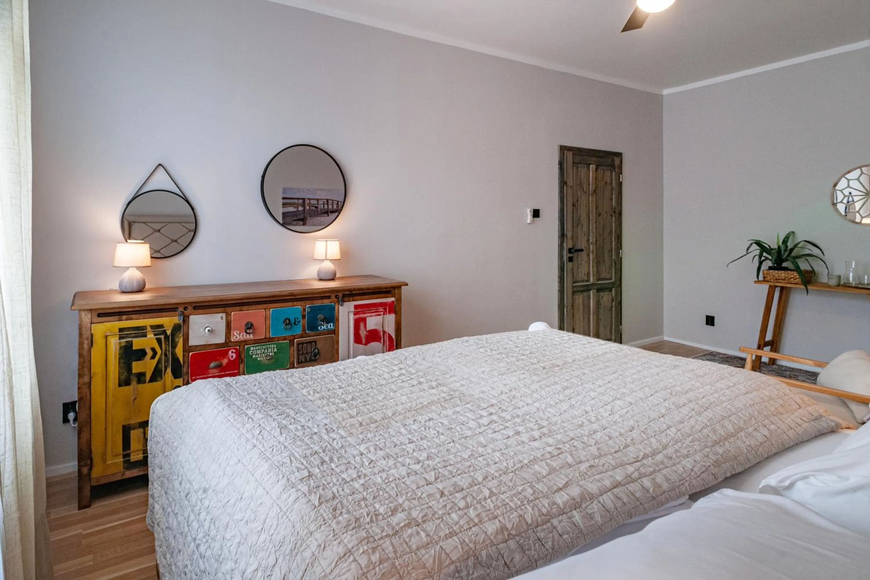 Bed in STING Boutique Apartments