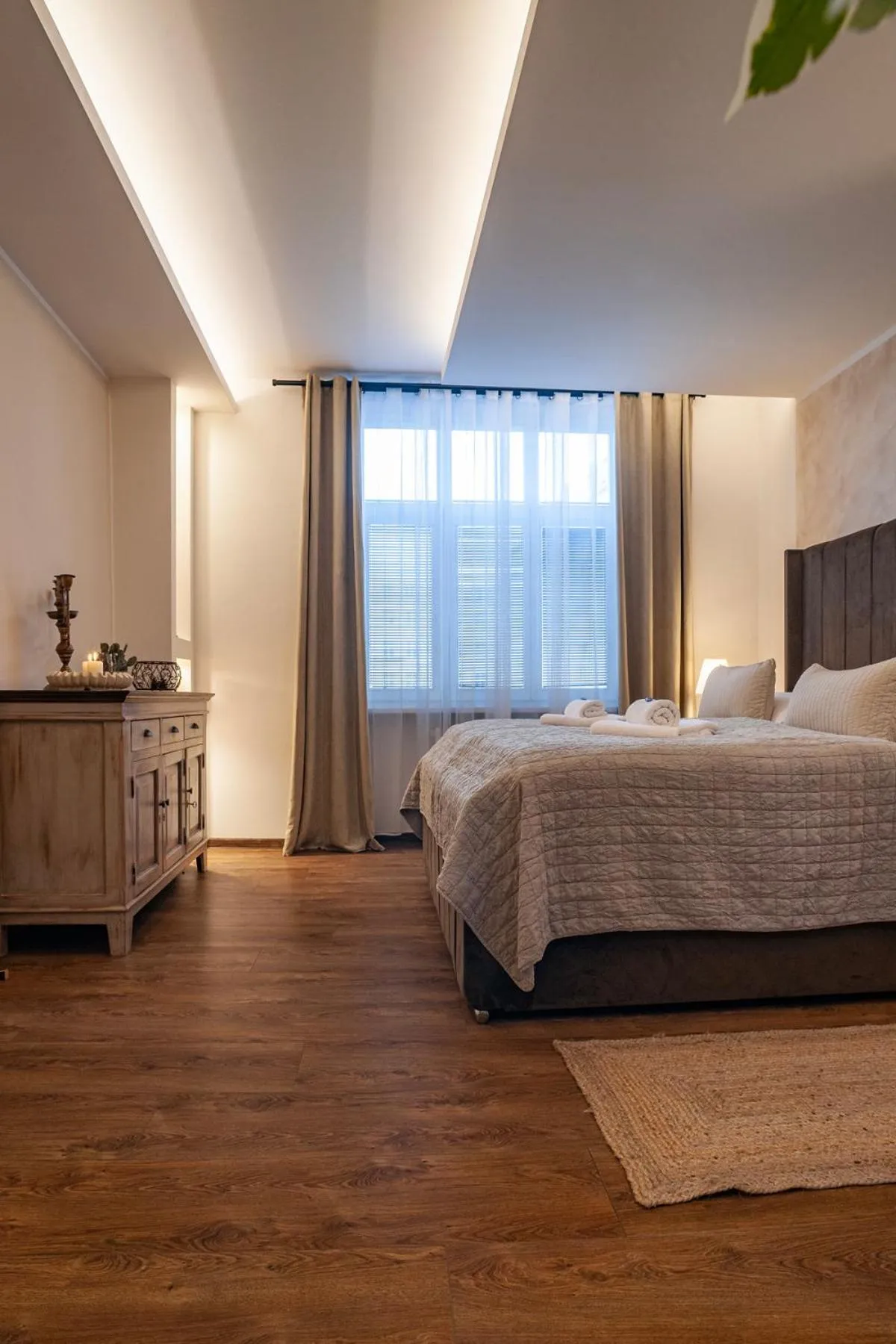 Bed in STING Boutique Apartments