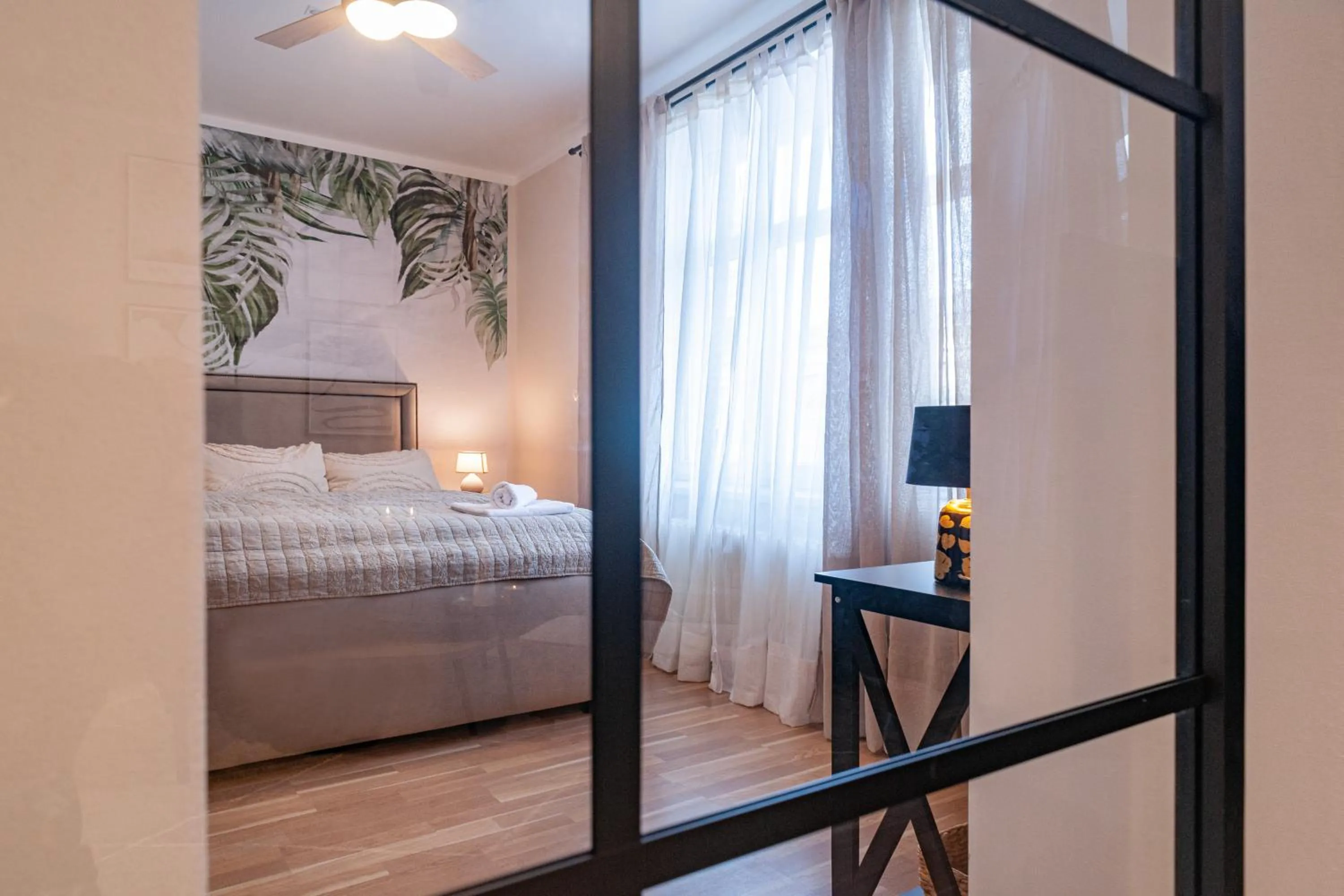 Bed in STING Boutique Apartments