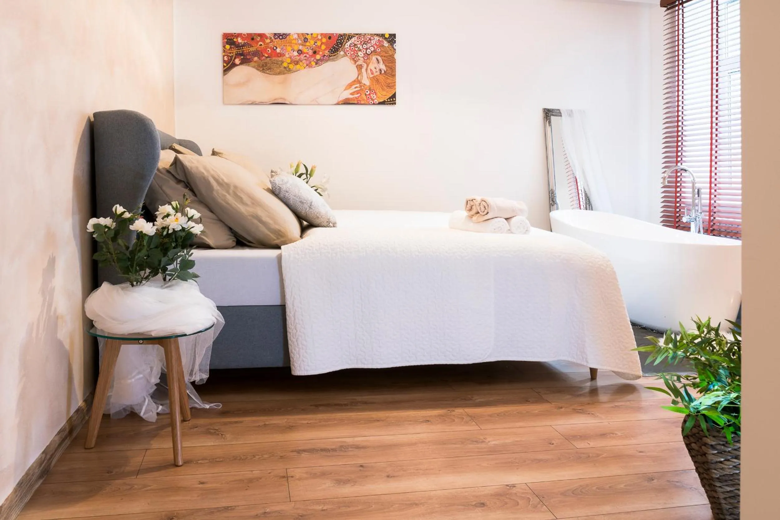 Bed in STING Boutique Apartments