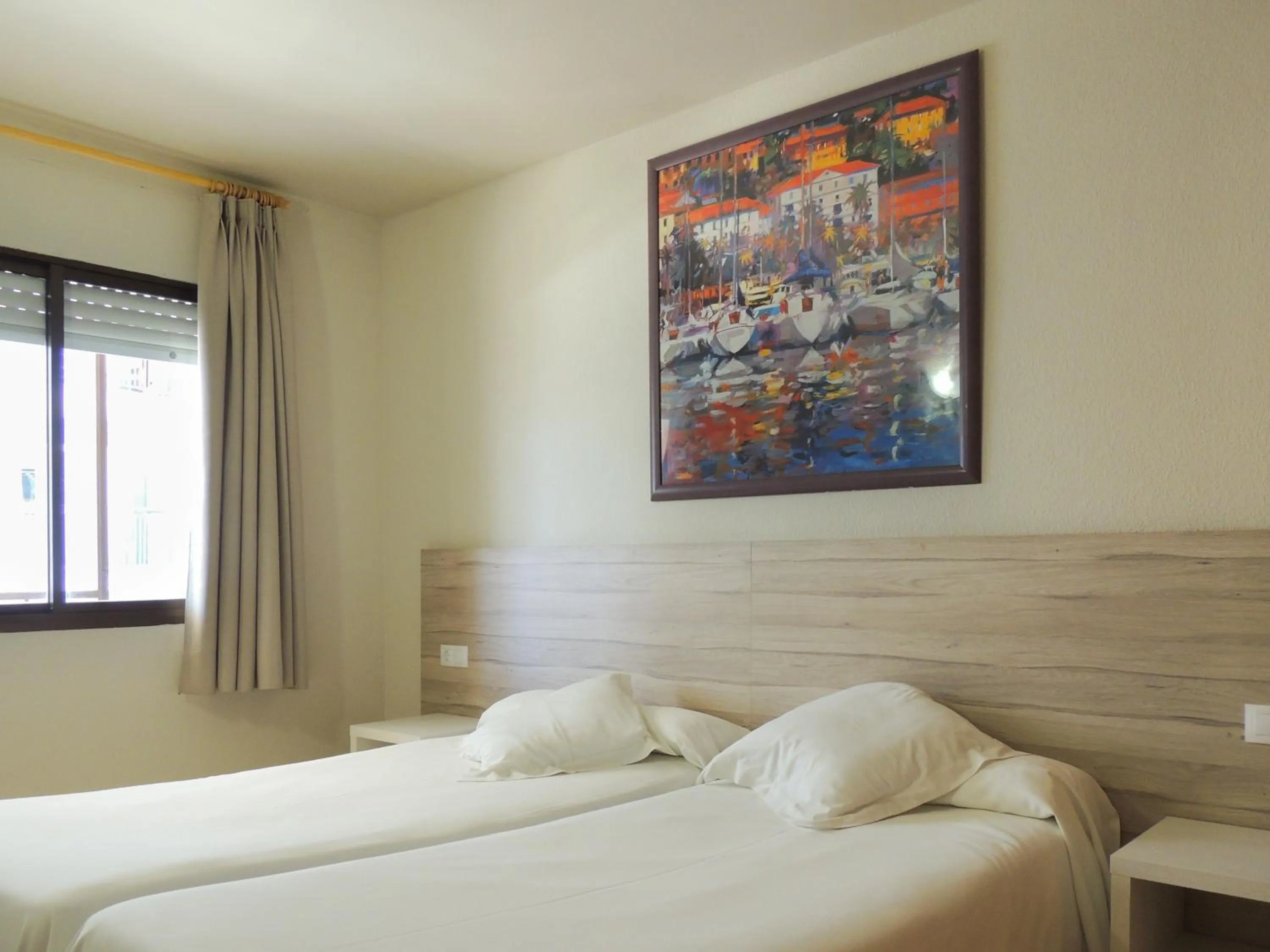 Bed in Apartamentos Turísticos Augustus