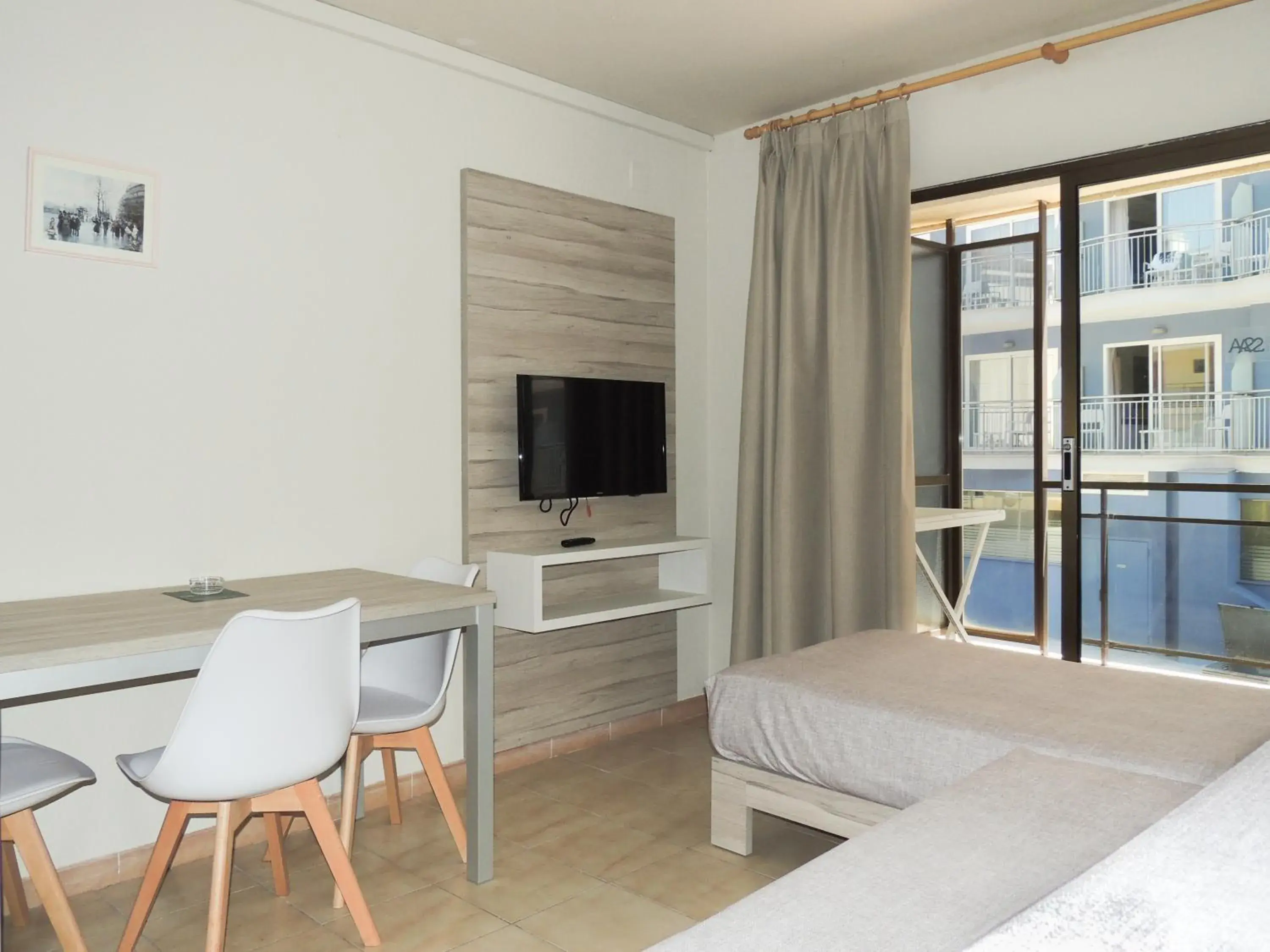 Dining area, Bed in Apartamentos Turísticos Augustus Dining area, Bed in Apartamentos Turísticos Augustus