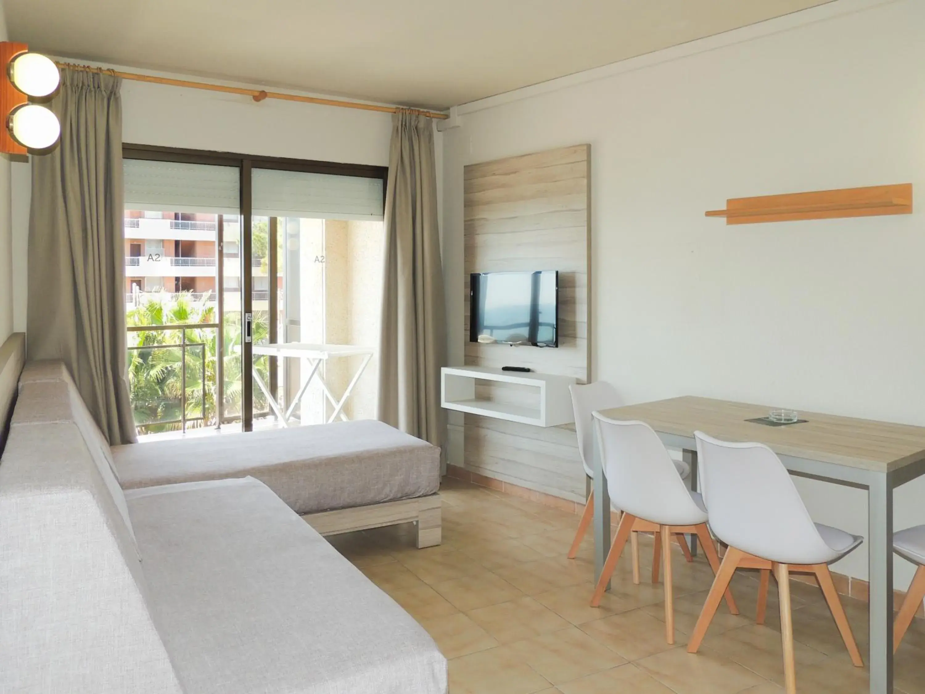 Dining area, Bed in Apartamentos Turísticos Augustus Dining area, Bed in Apartamentos Turísticos Augustus