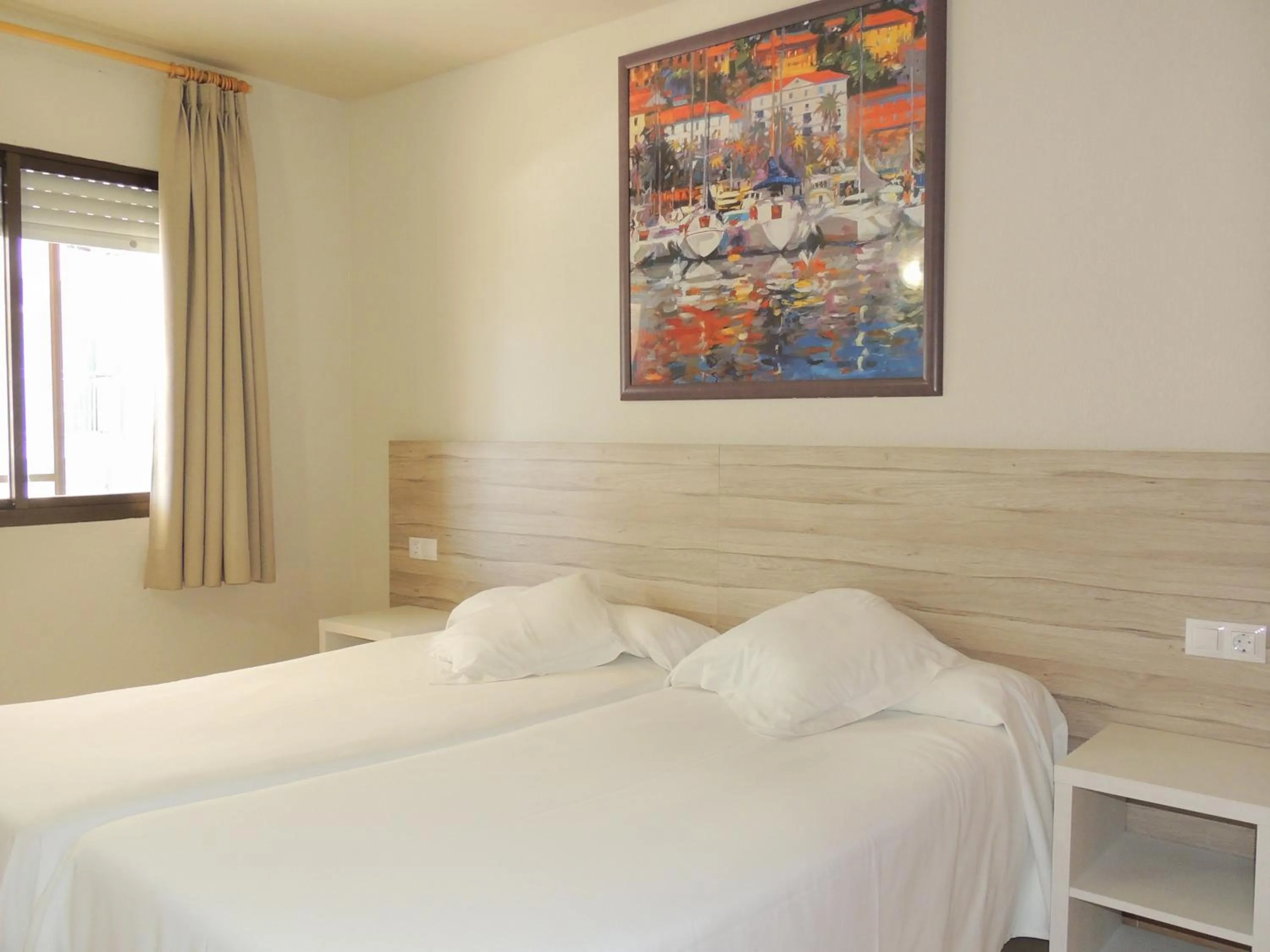 Bed in Apartamentos Turísticos Augustus