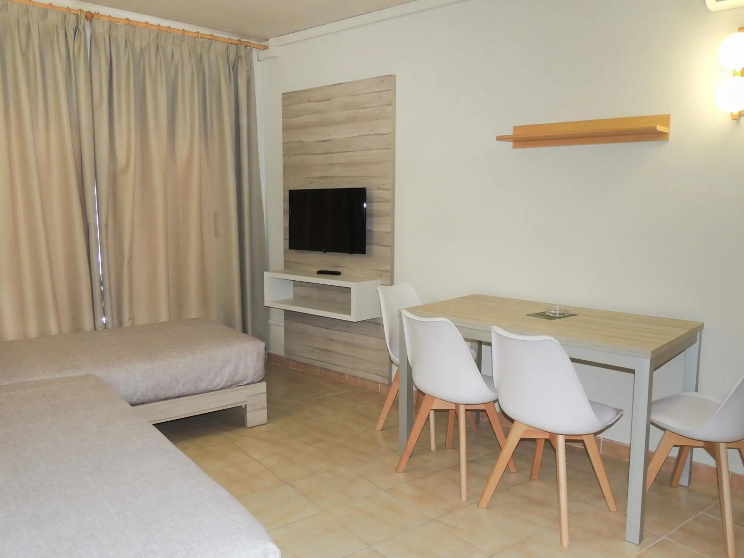 Photo of the whole room, Bed in Apartamentos Turísticos Augustus Photo of the whole room, Bed in Apartamentos Turísticos Augustus