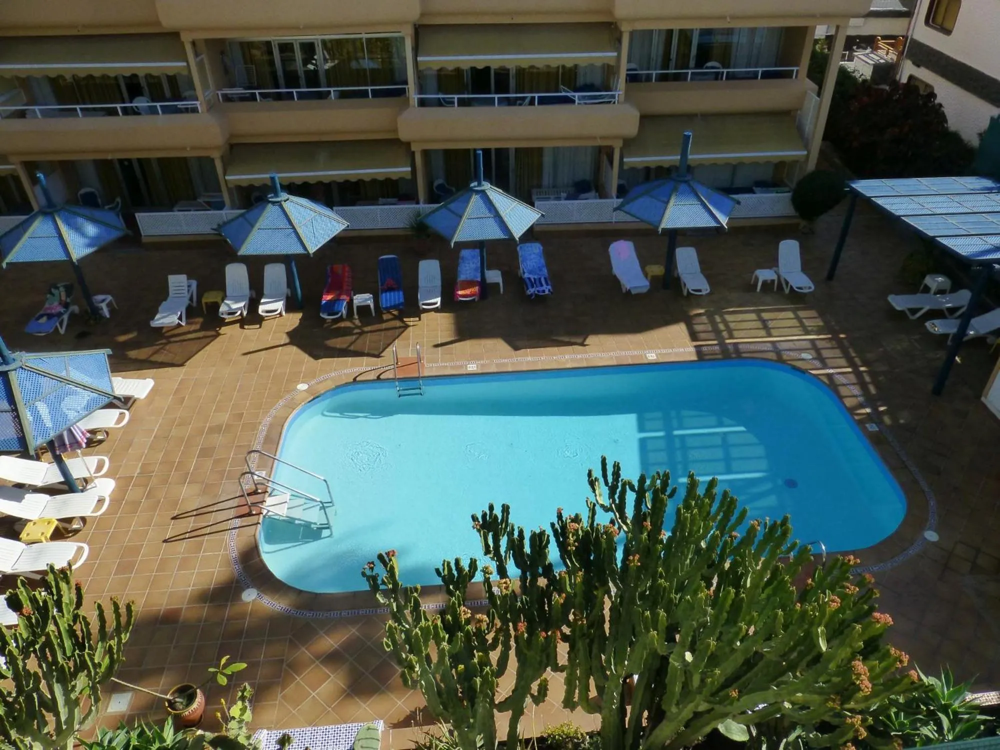 Swimming pool in Apartamentos Belmonte
