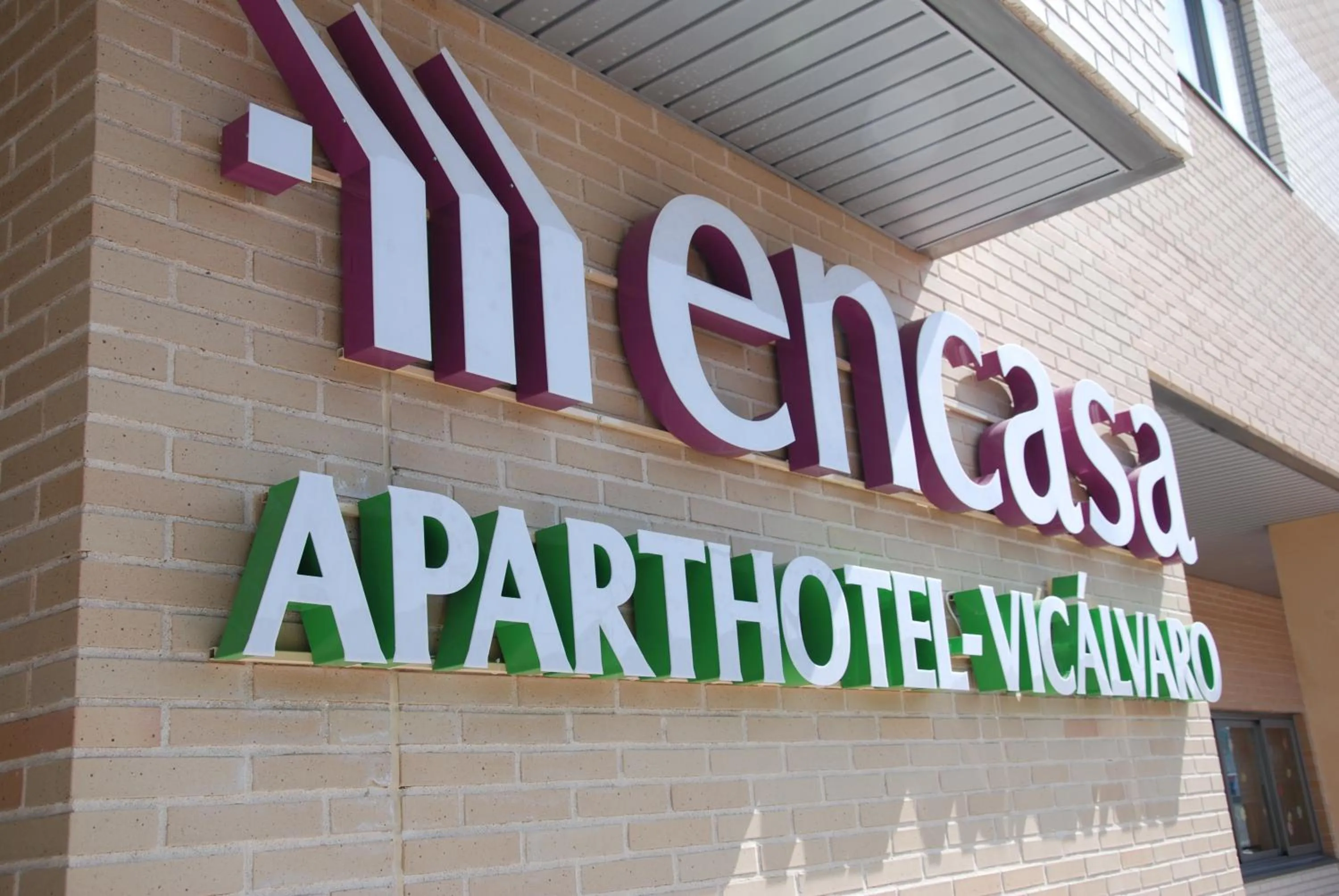 Property logo or sign in Aparthotel Encasa