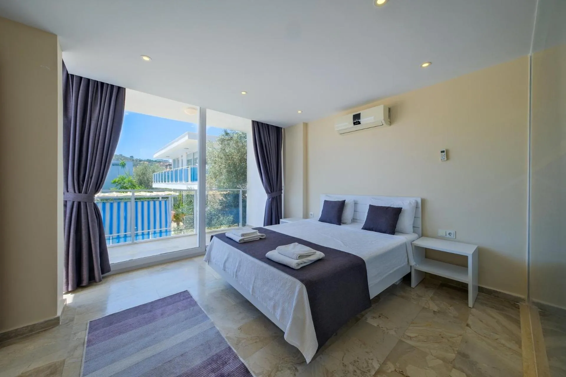Bed in Lumiere Villas 2