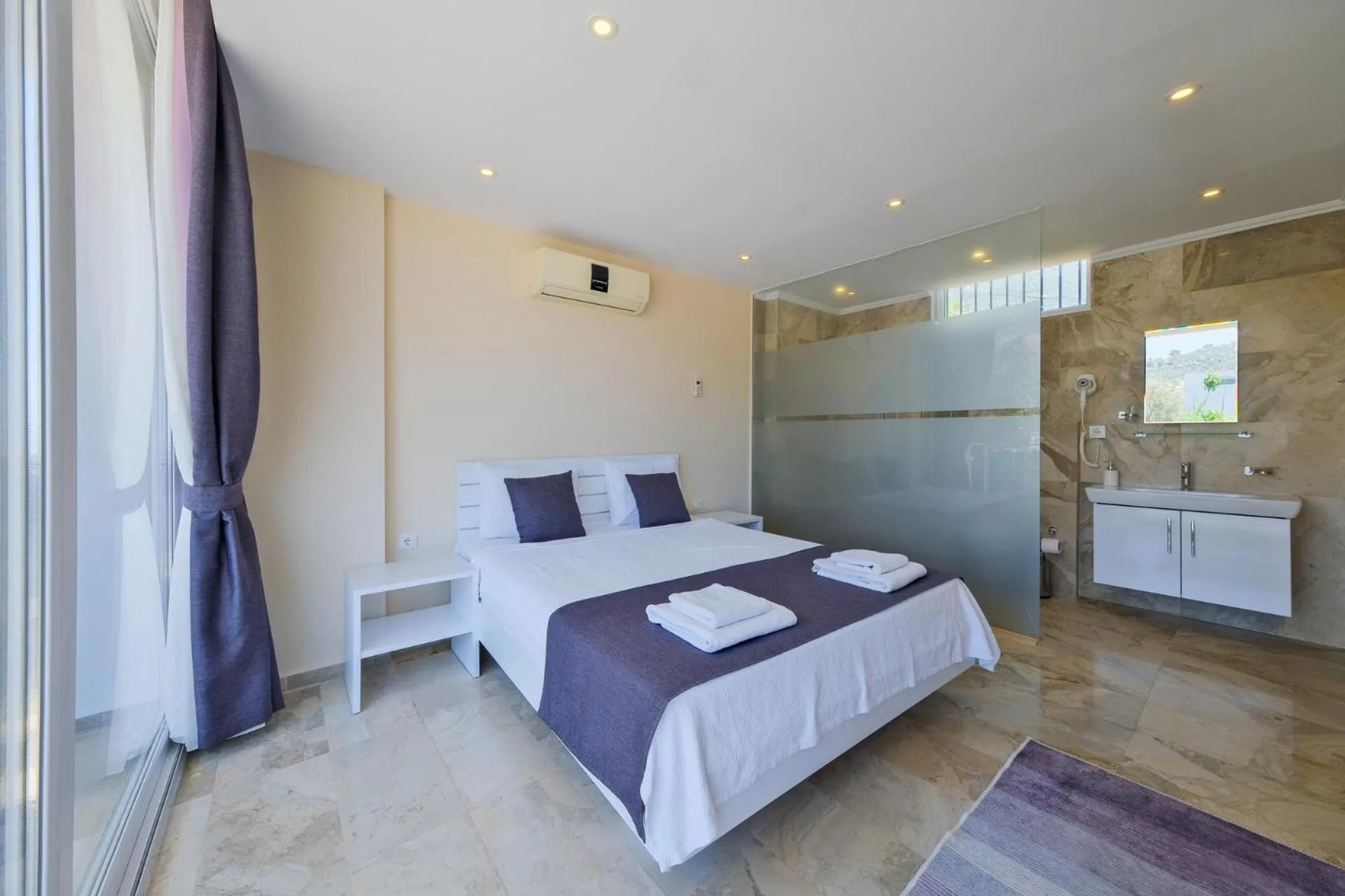Bed in Lumiere Villas 2