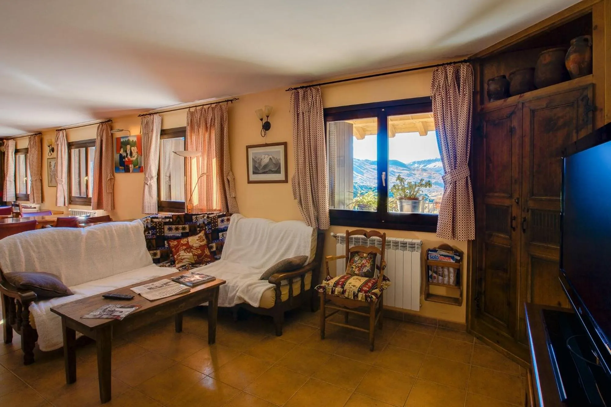 Communal lounge/ TV room, Bed in Hostal Parque Natural