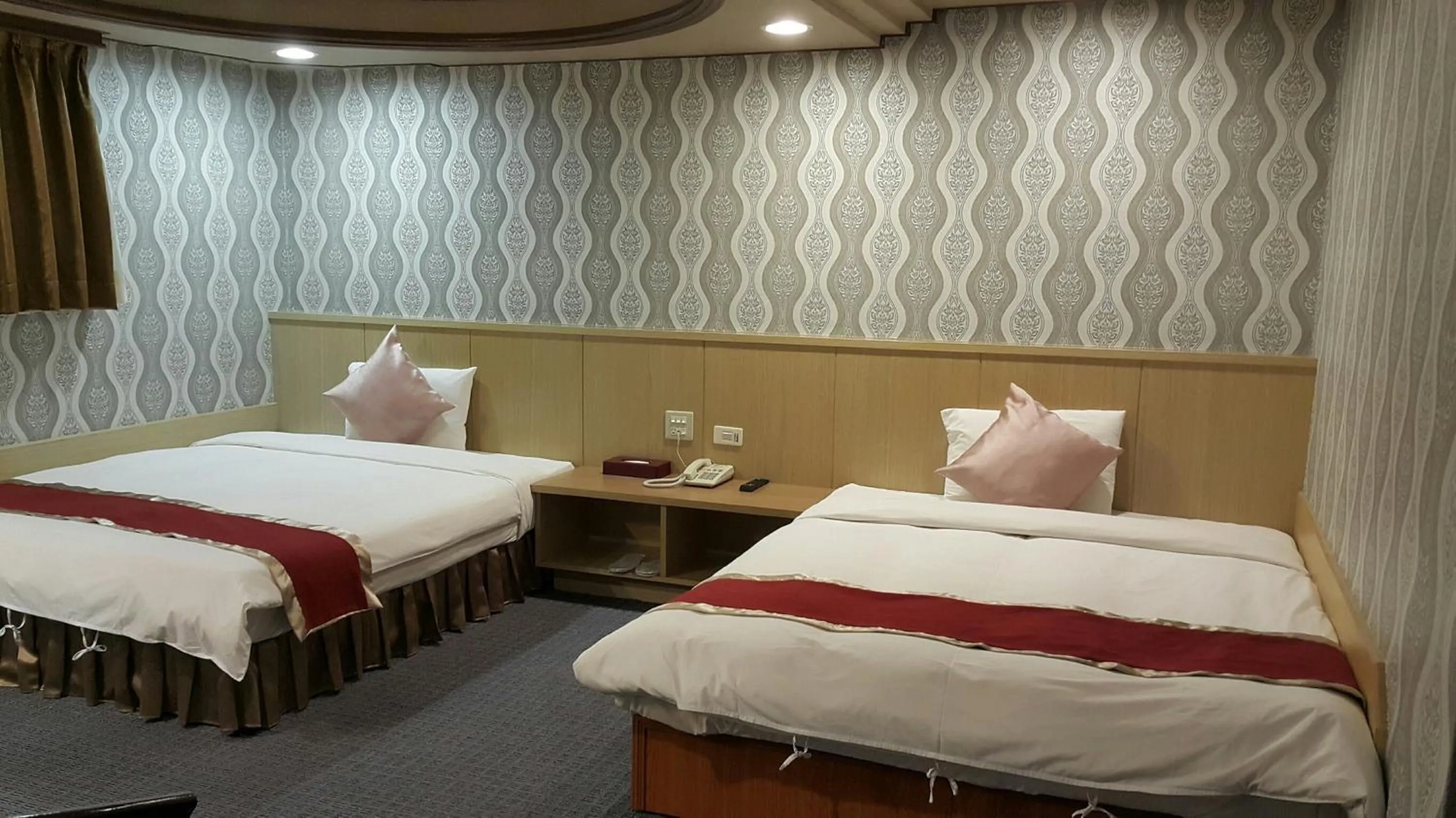 Bed in Mei Hua Hotel