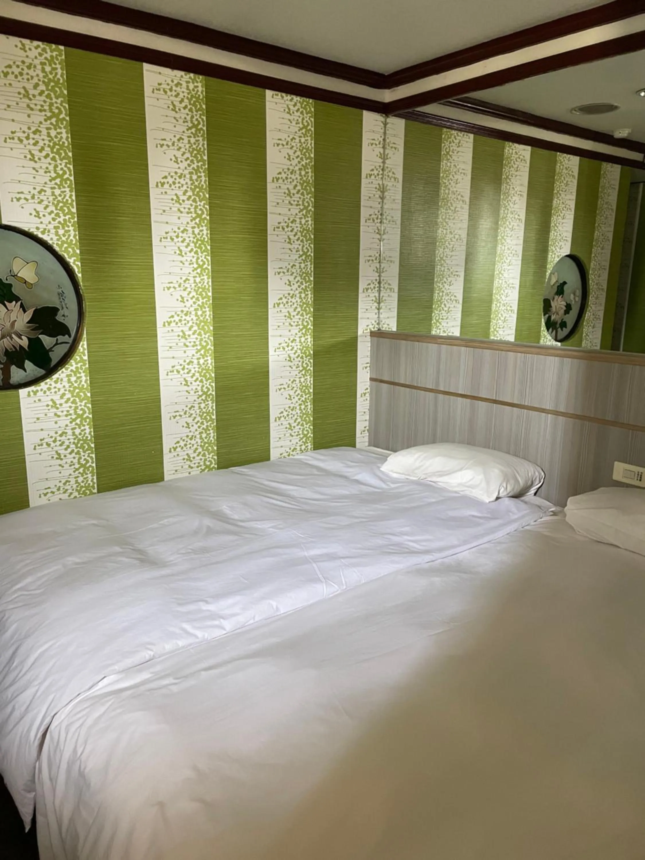 Bed in Mei Hua Hotel