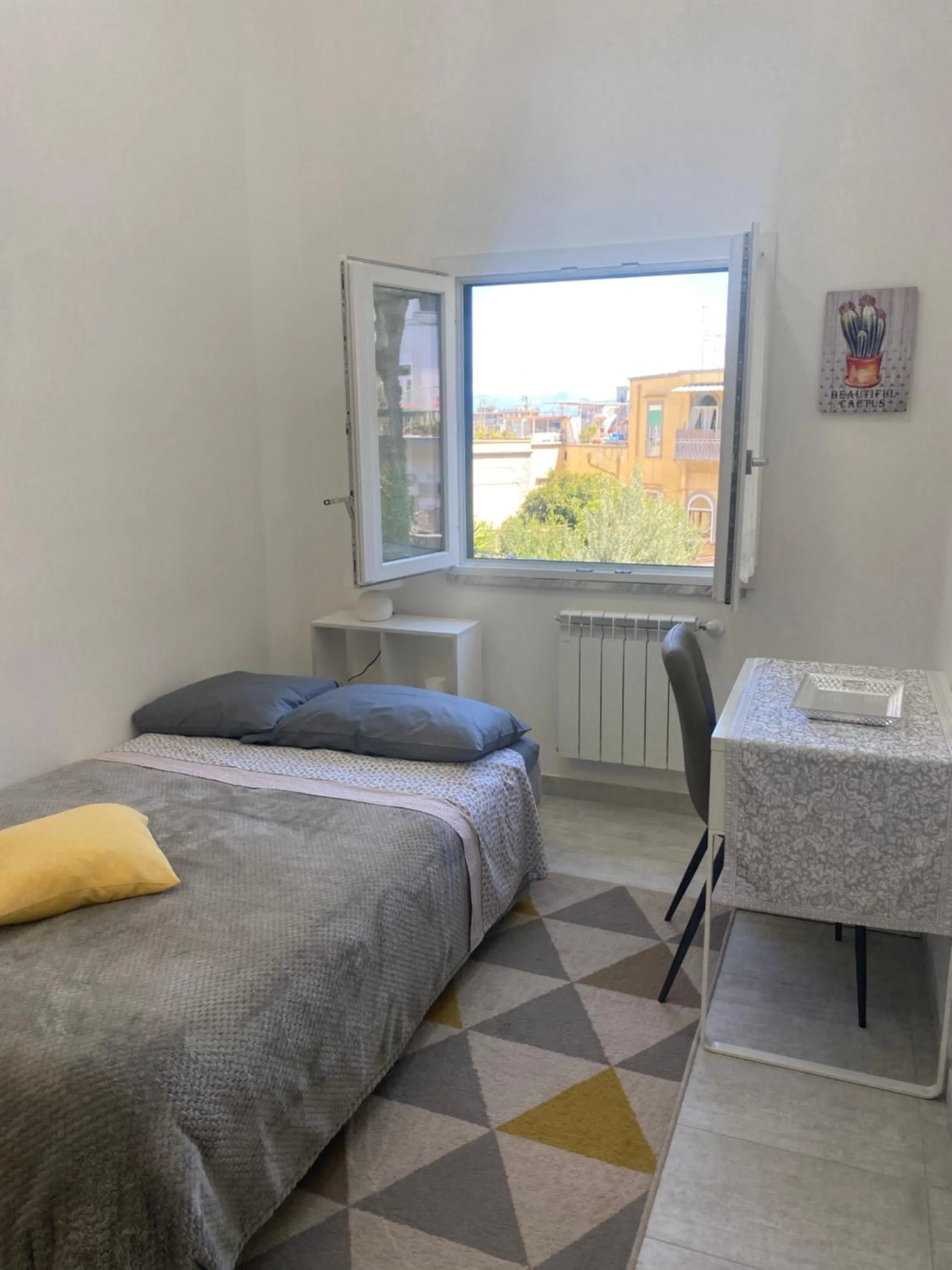Bed in GARDEN HOUSE Apartments in Naples