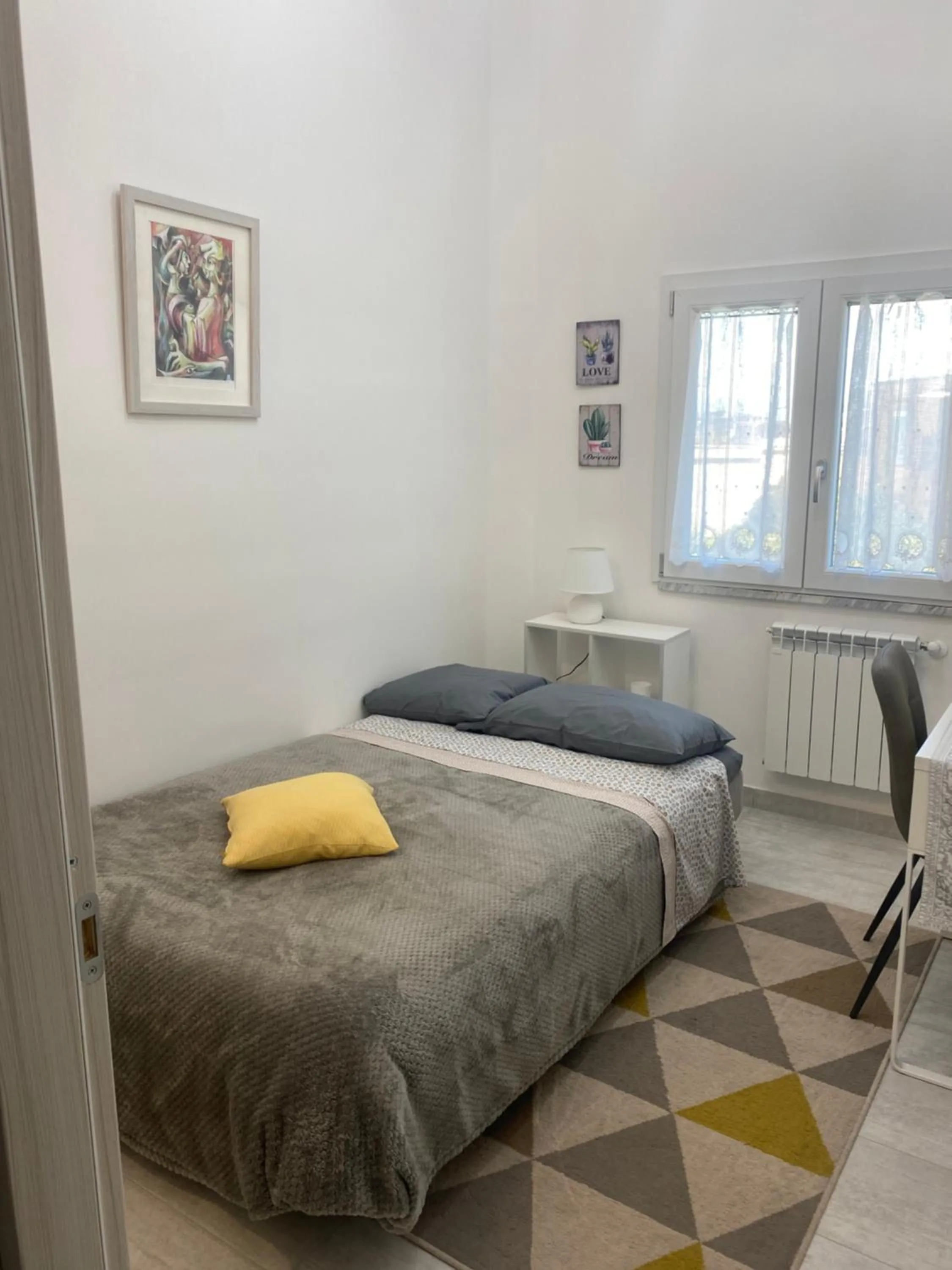 Bed in GARDEN HOUSE Apartments in Naples