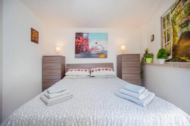 Bed in GARDEN HOUSE Apartments in Naples