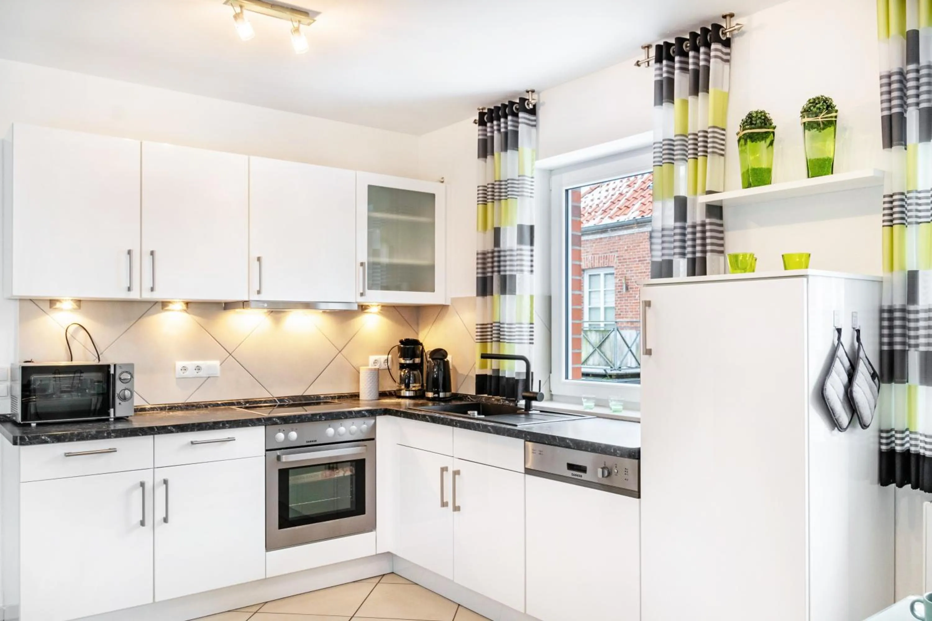 Kitchen or kitchenette in Ferienwohnung Hilbers