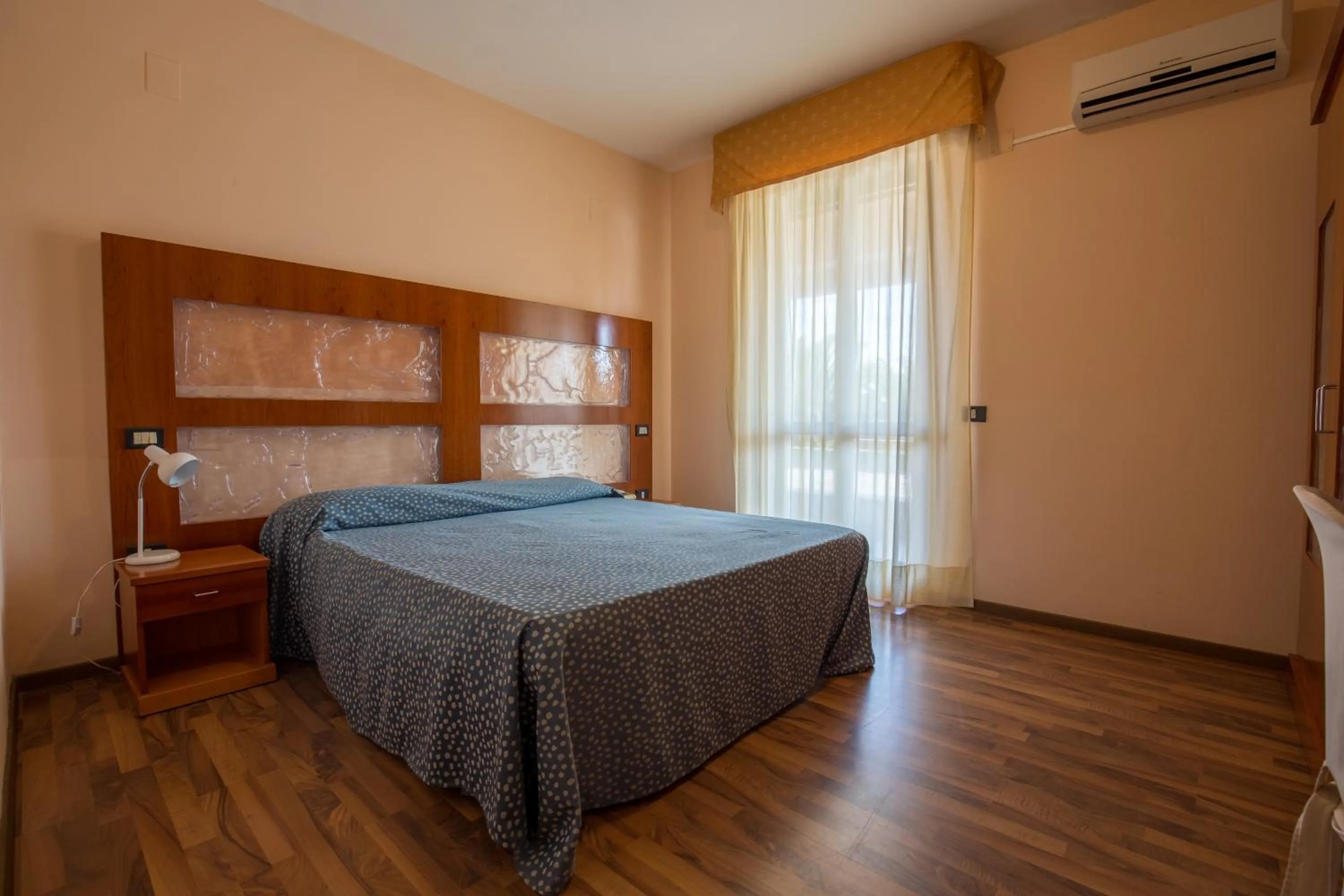 Bed in Hotel L'Aragosta