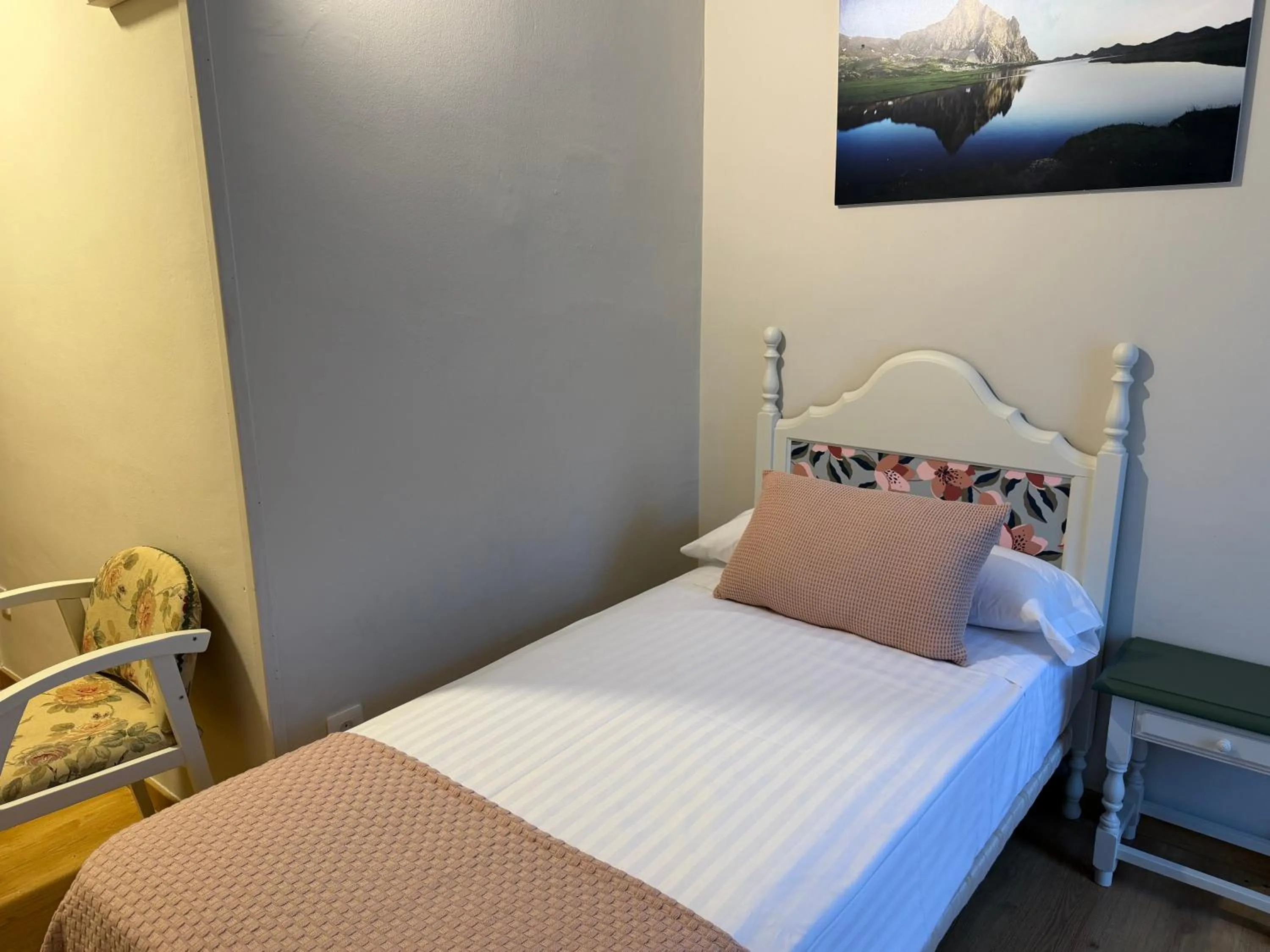 Bed in Edelweiss Hotel